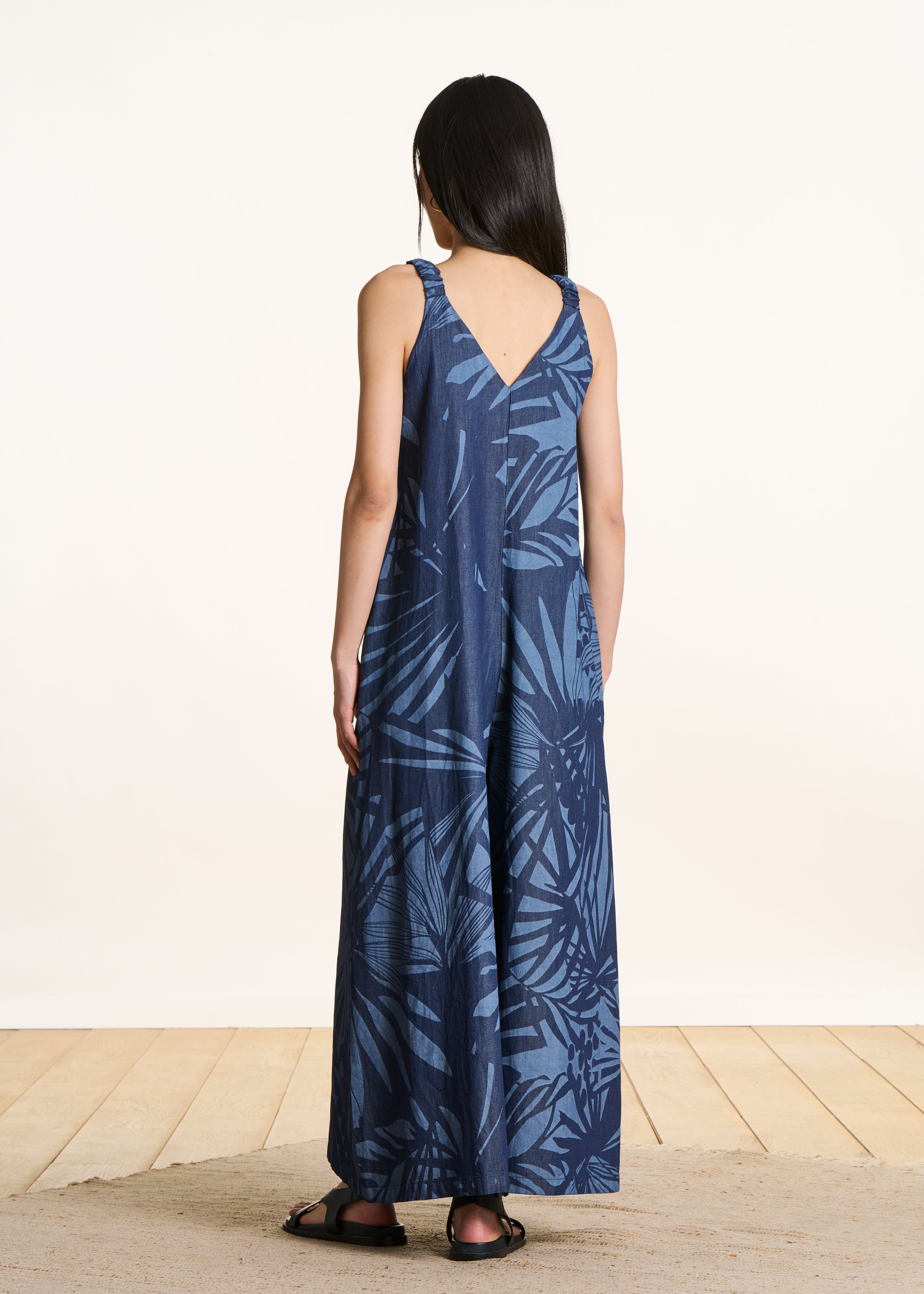 Navy blue cotton jumpsuit with straps and print