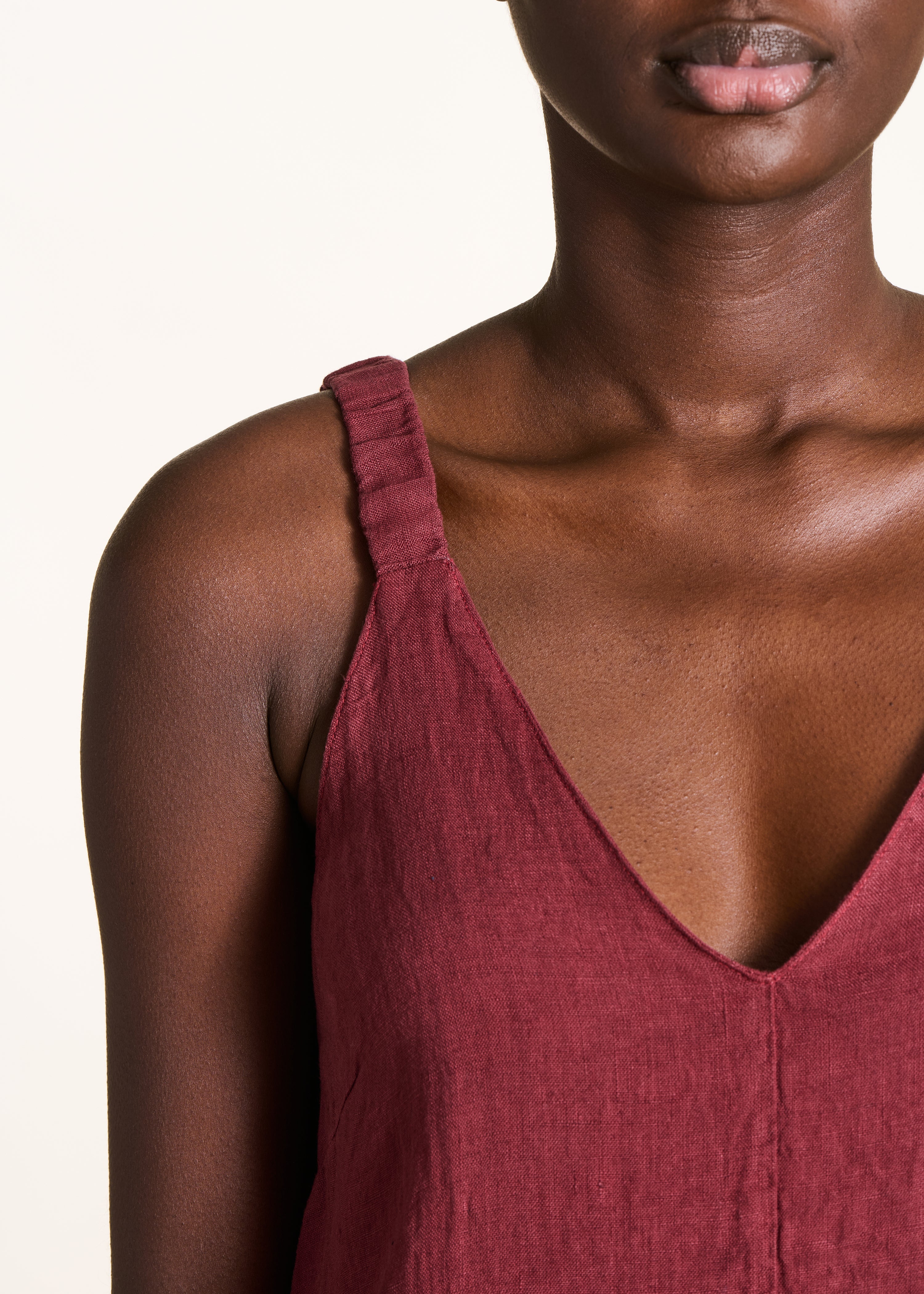 Burgundy linen jumpsuit with elastic straps