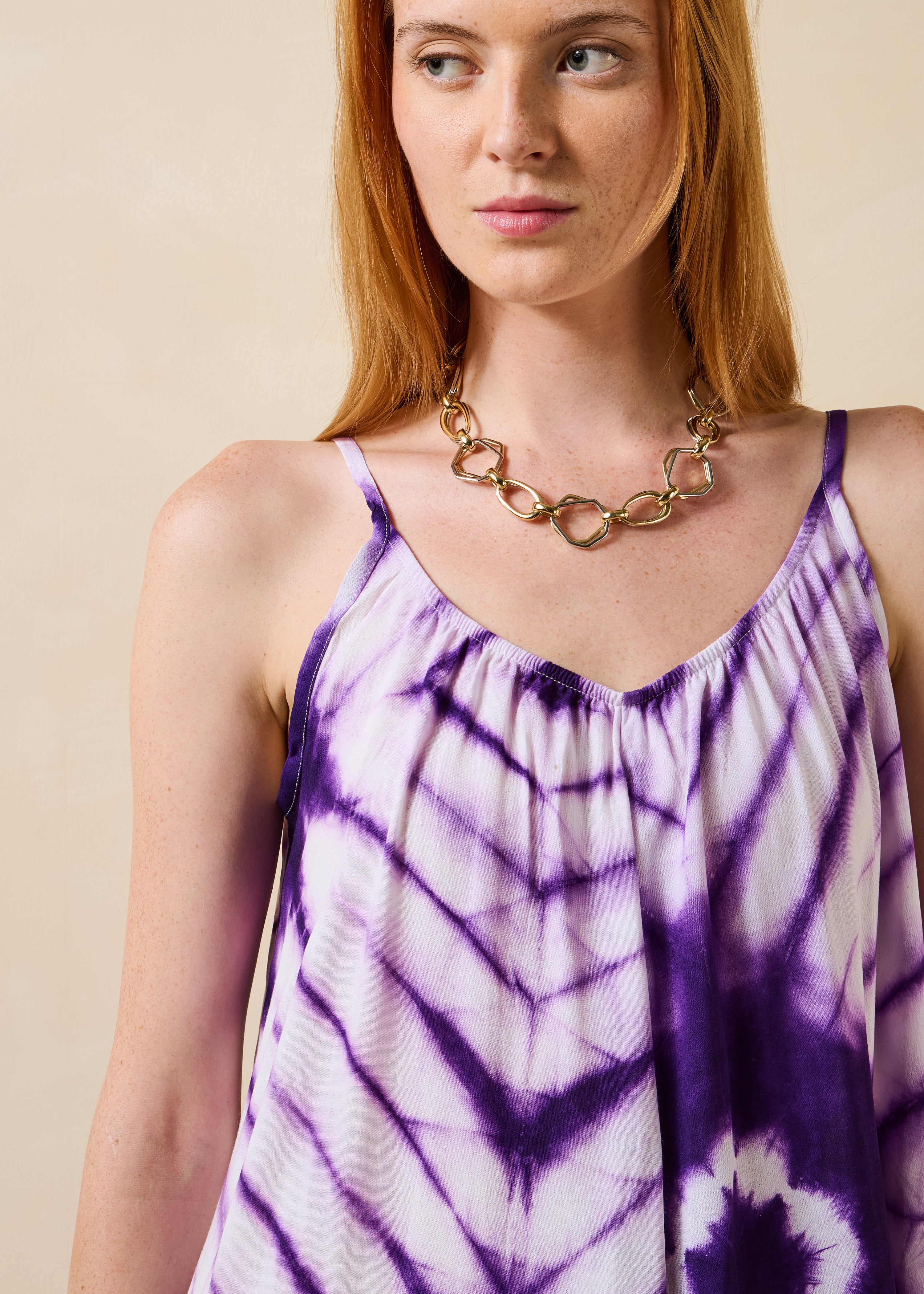 Loose purple printed jumpsuit with straps