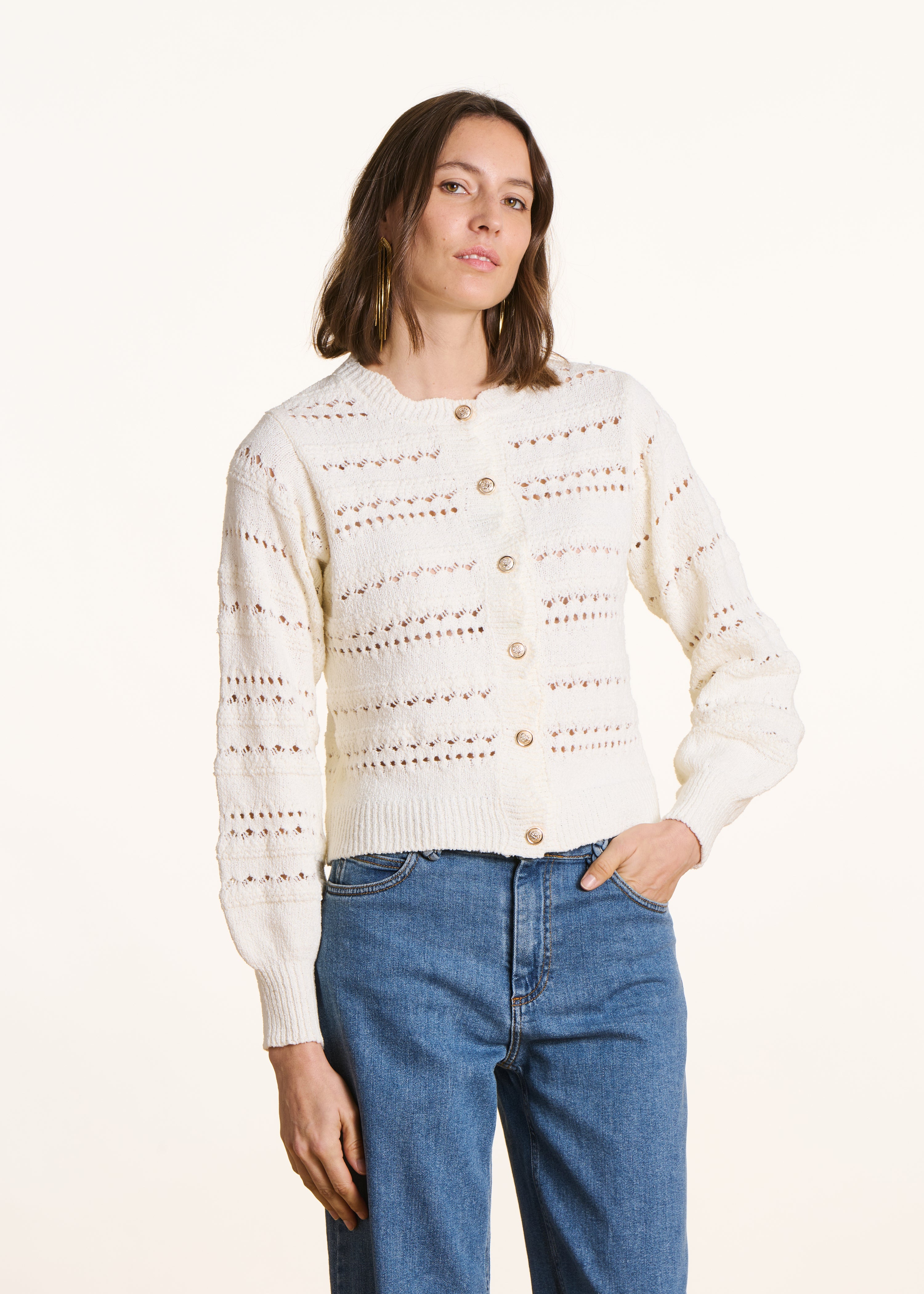 Ecru openwork knit cardigan with decorative buttons