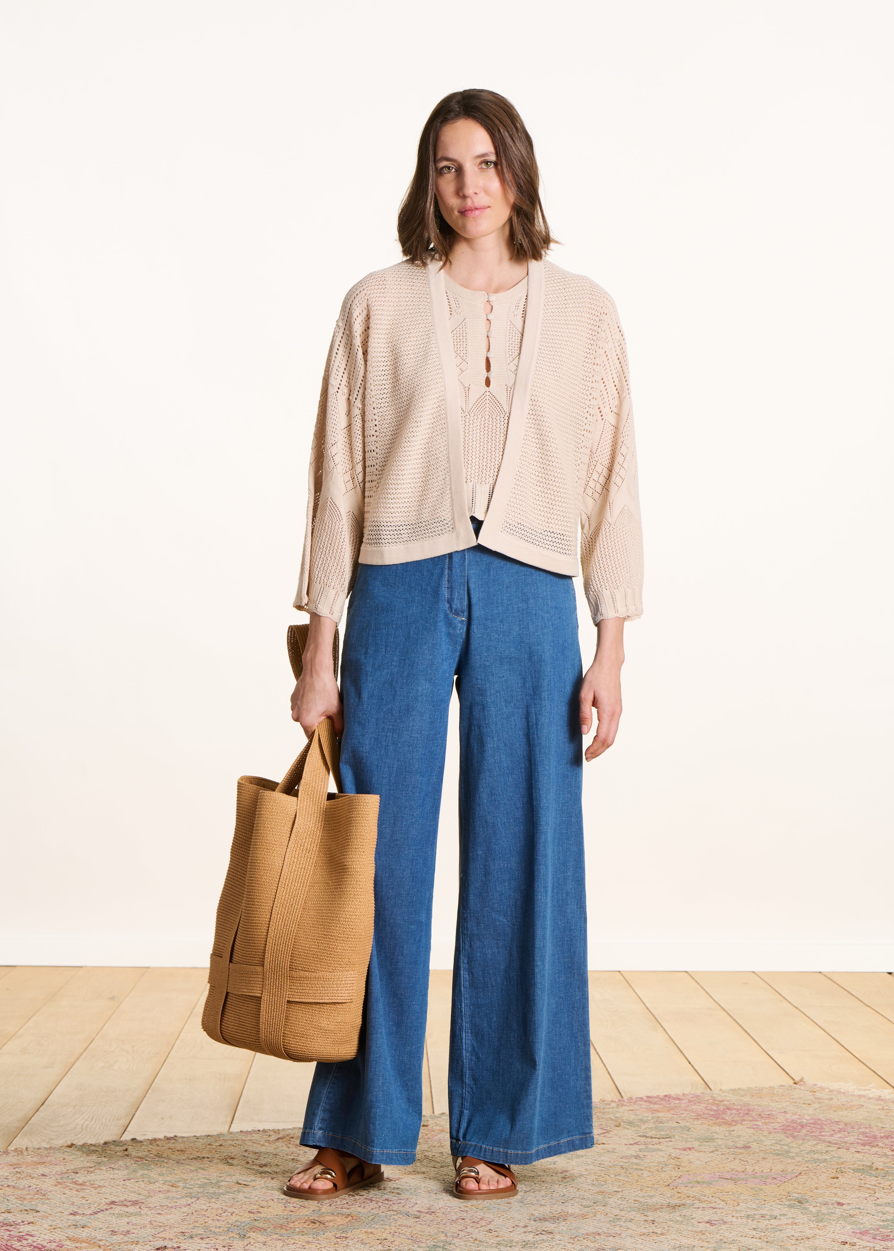 Korte beige gilet in pointelle breisel