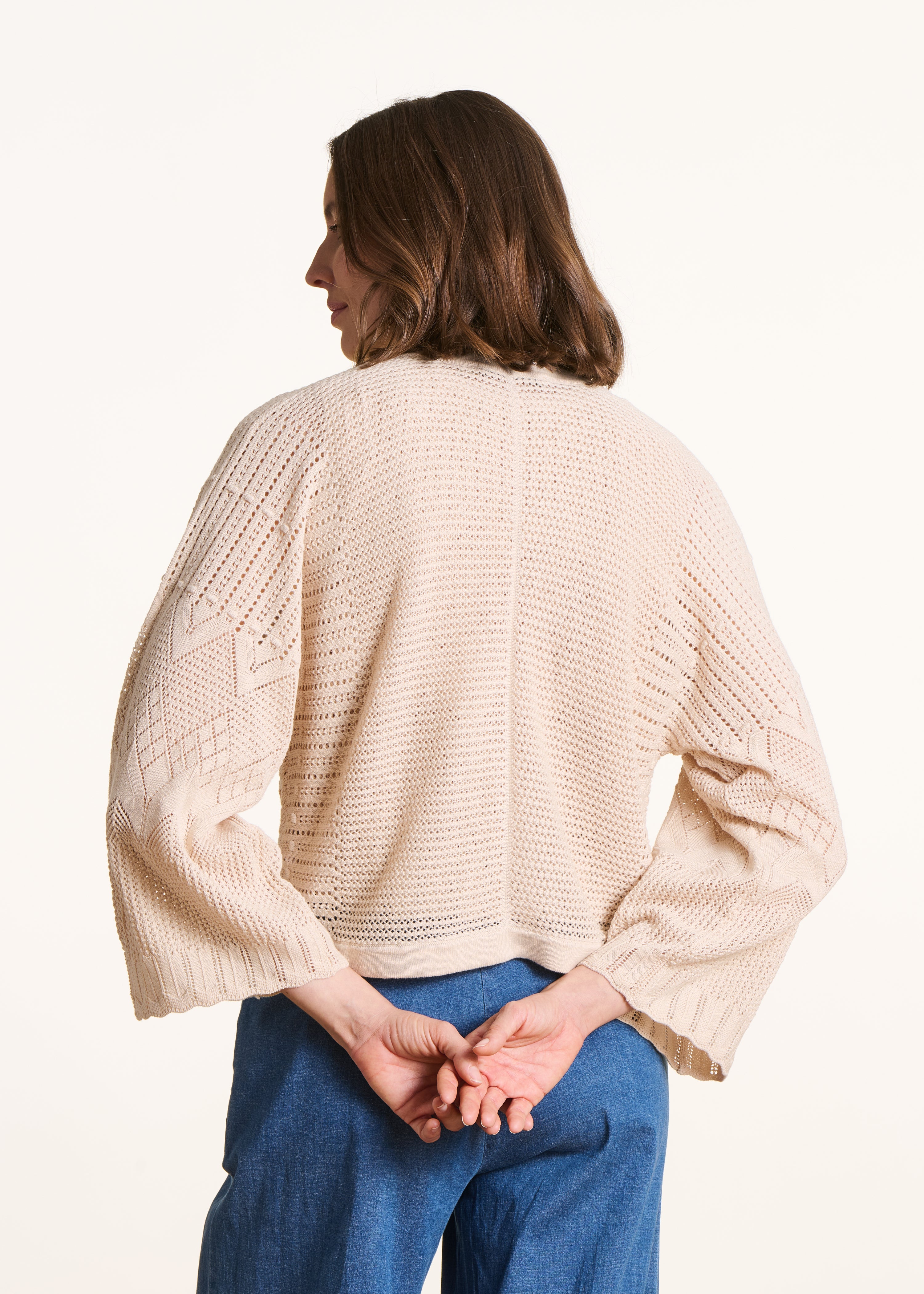 Korte beige gilet in pointelle breisel