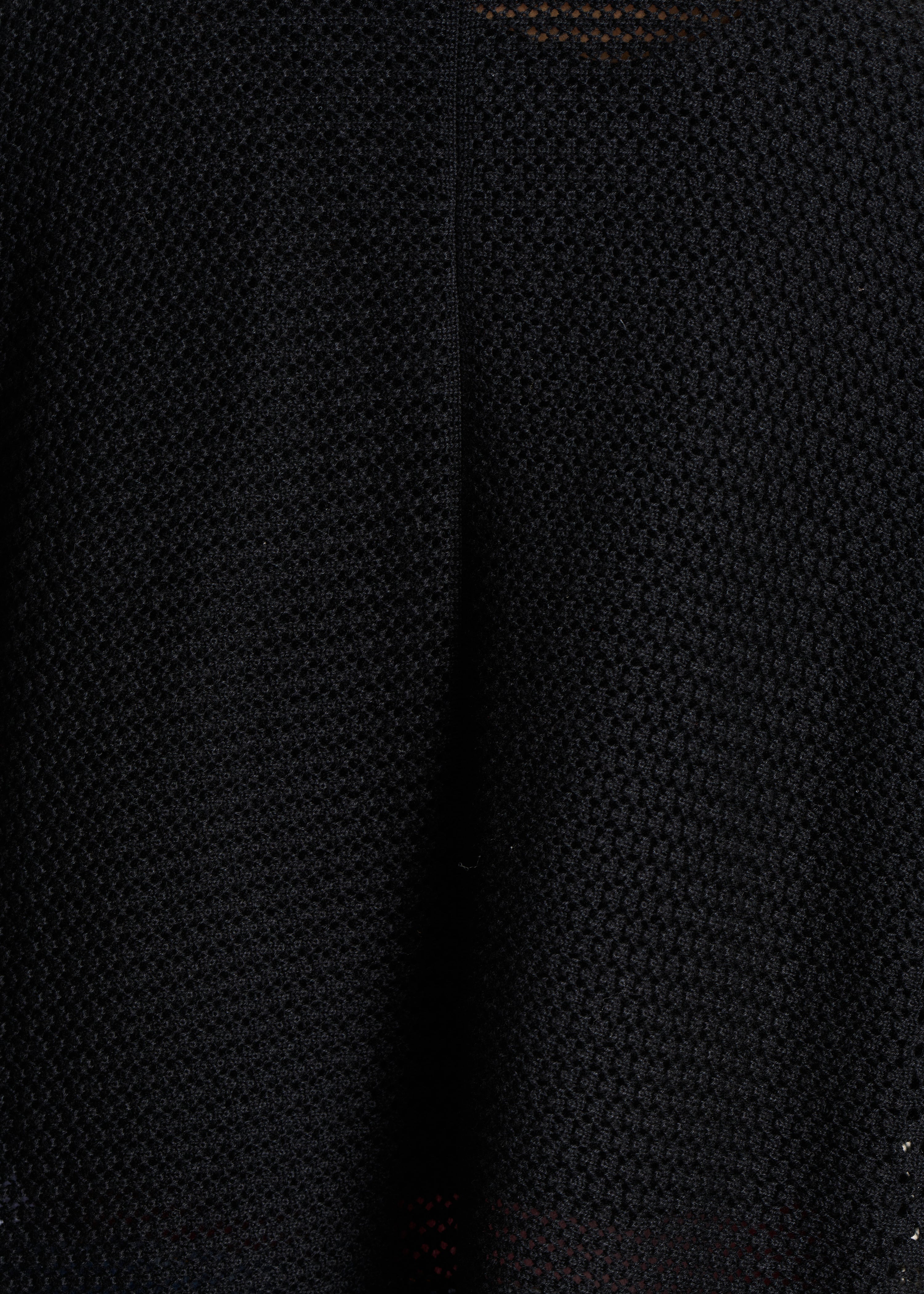 Short black cardigan in pointelle knit