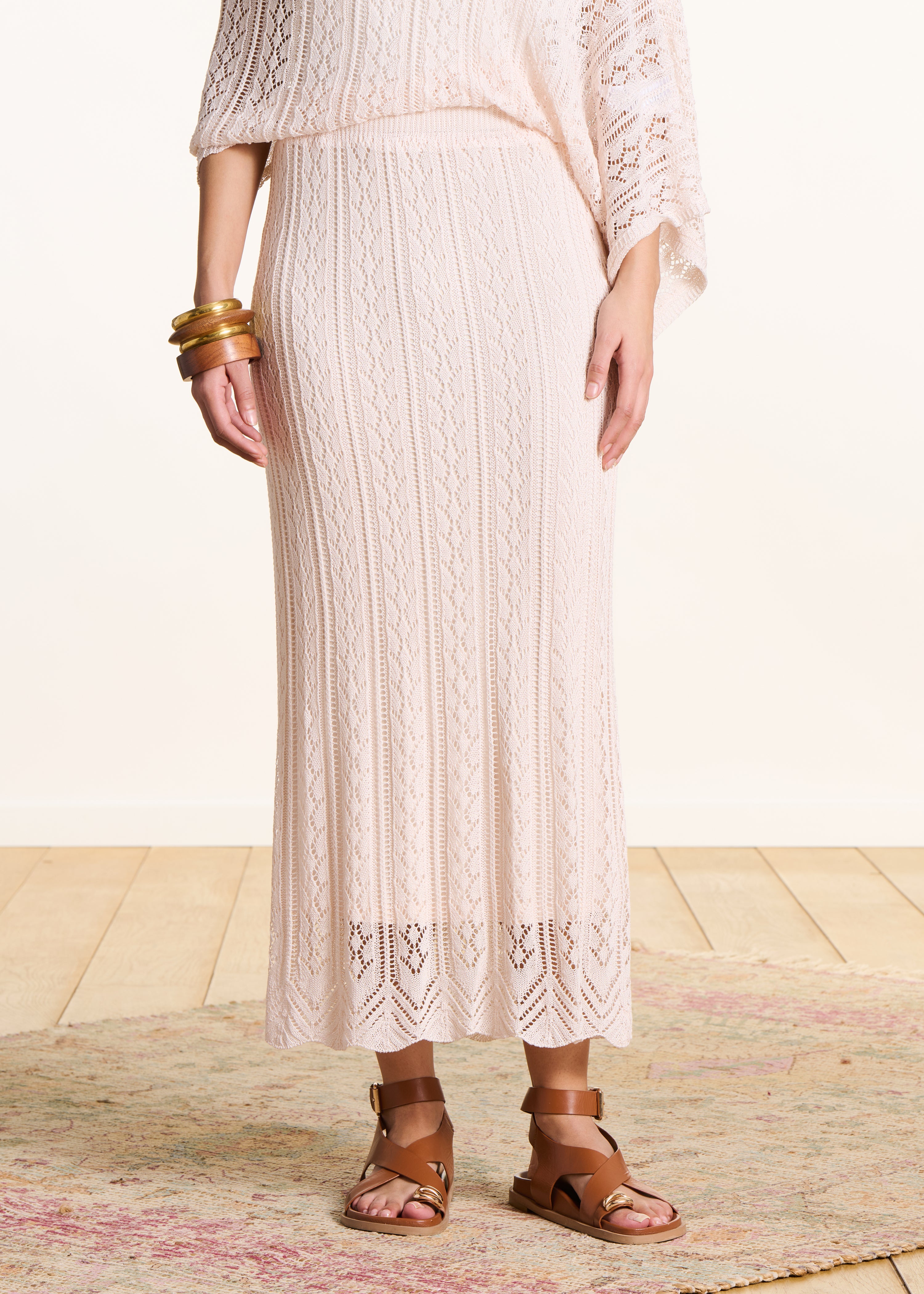 Mid-length skirt in openwork ecru knit