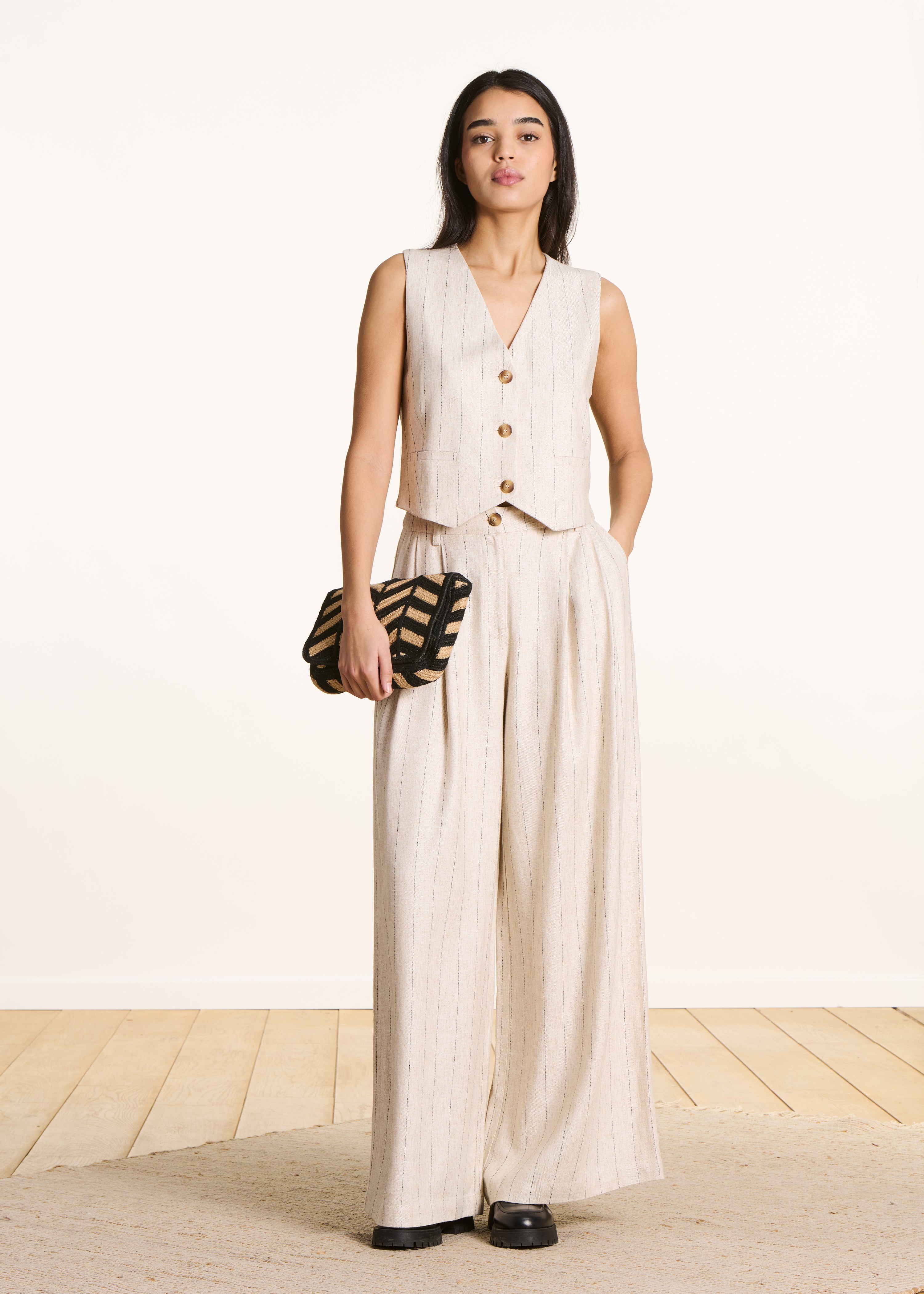 Pantalon large beige à rayures