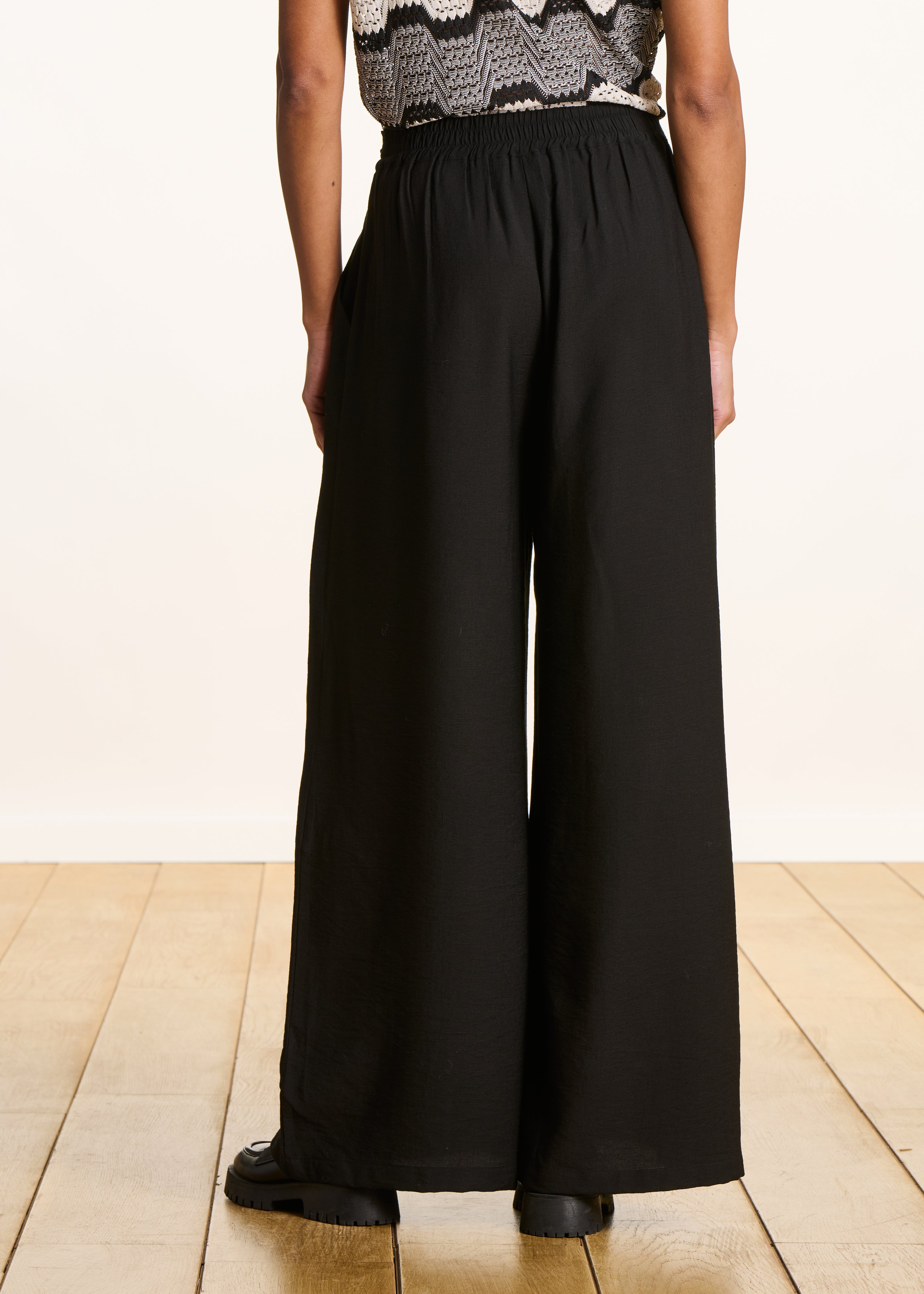 Pantalone largo nero in jacquard