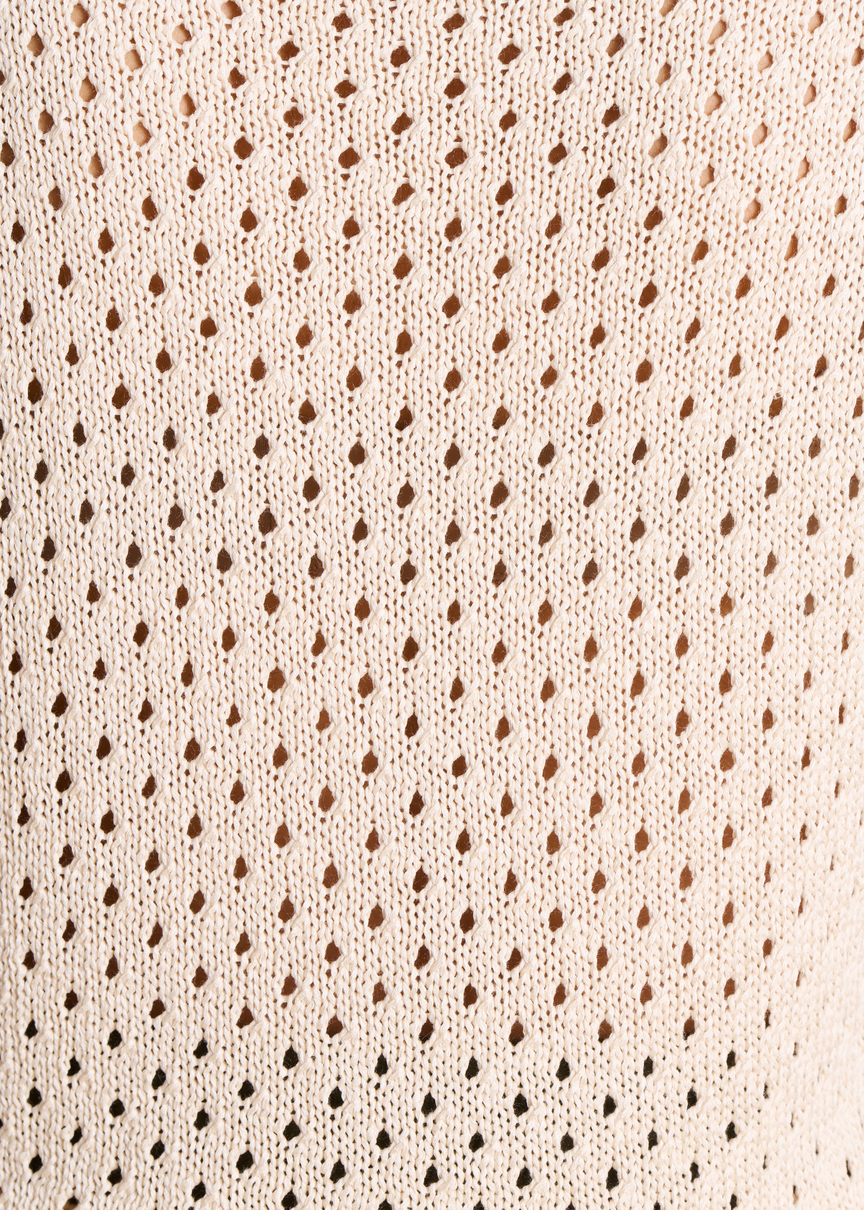 Pull sans manches écru en maille crochet ajourée