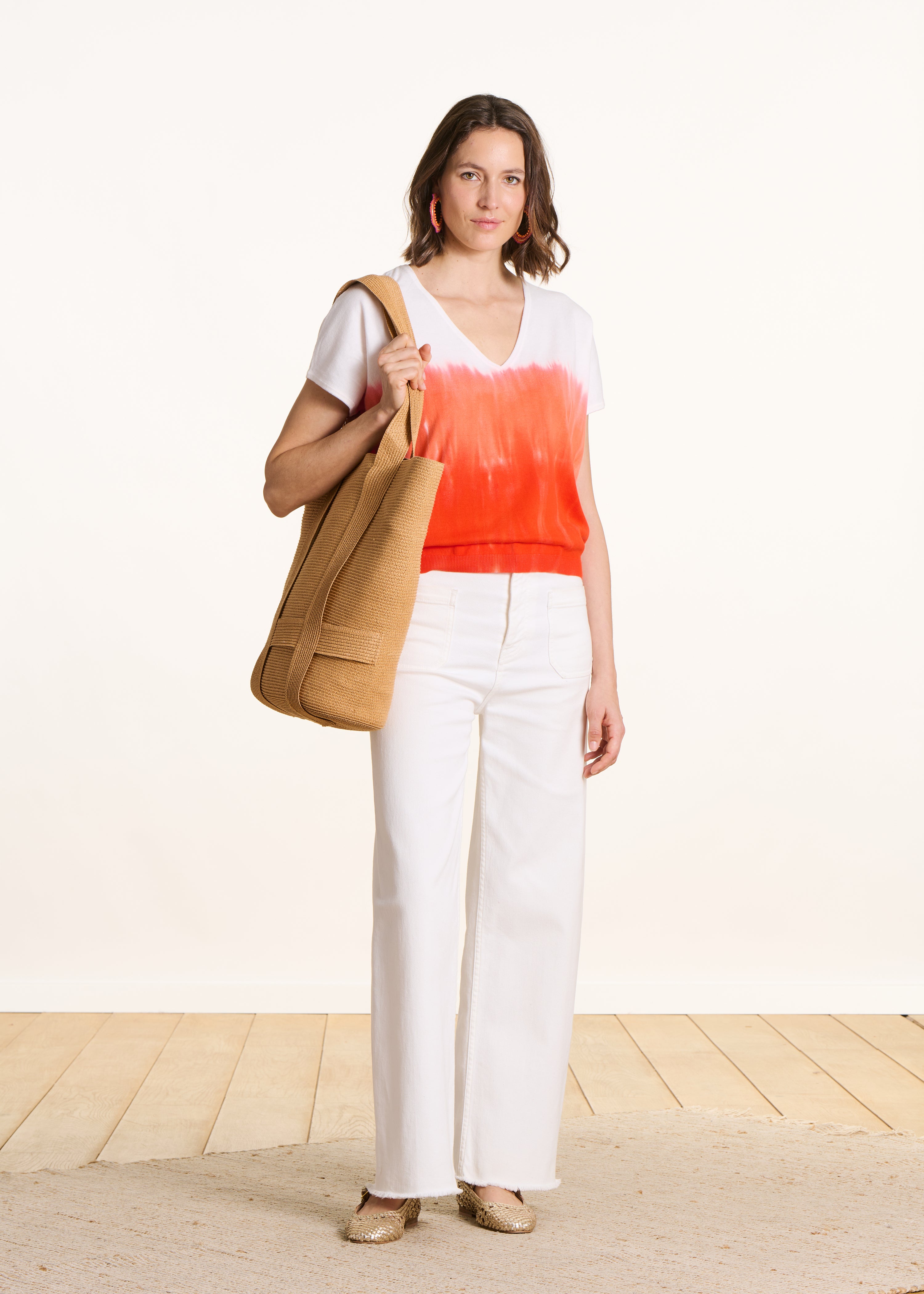 Maglione in cotone biologico con stampa tie & dye arancione