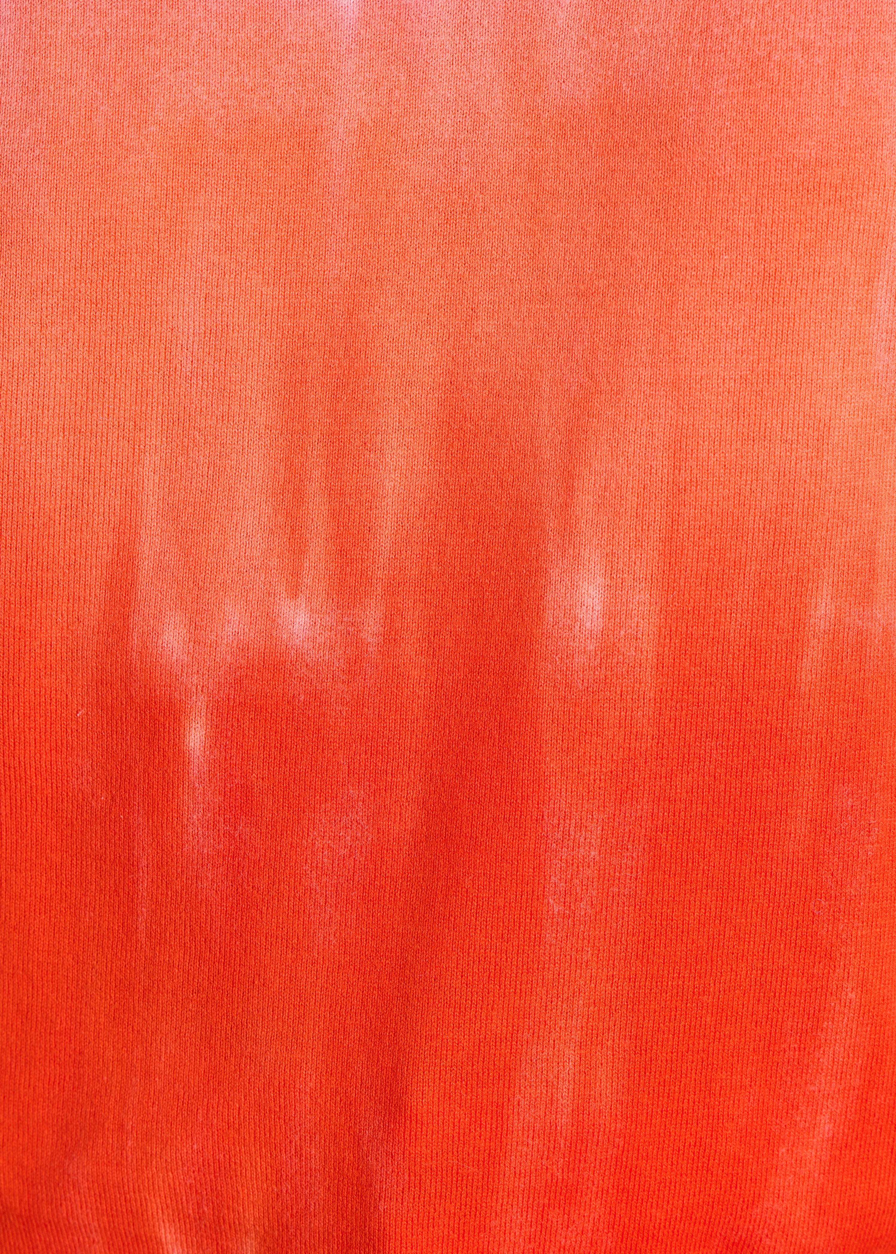 Maglione in cotone biologico con stampa tie & dye arancione