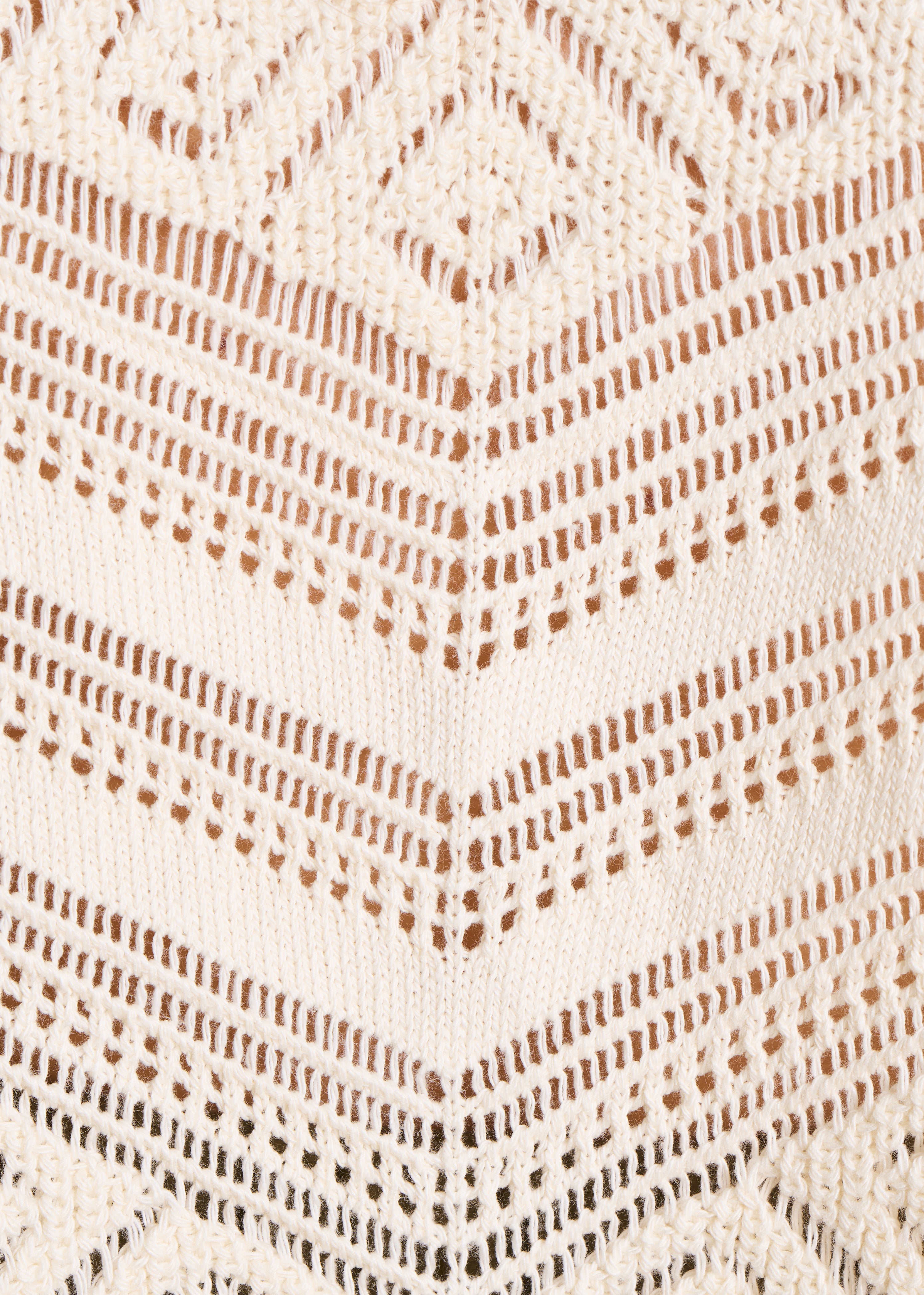 Pull manches courtes écru en maille ajourée