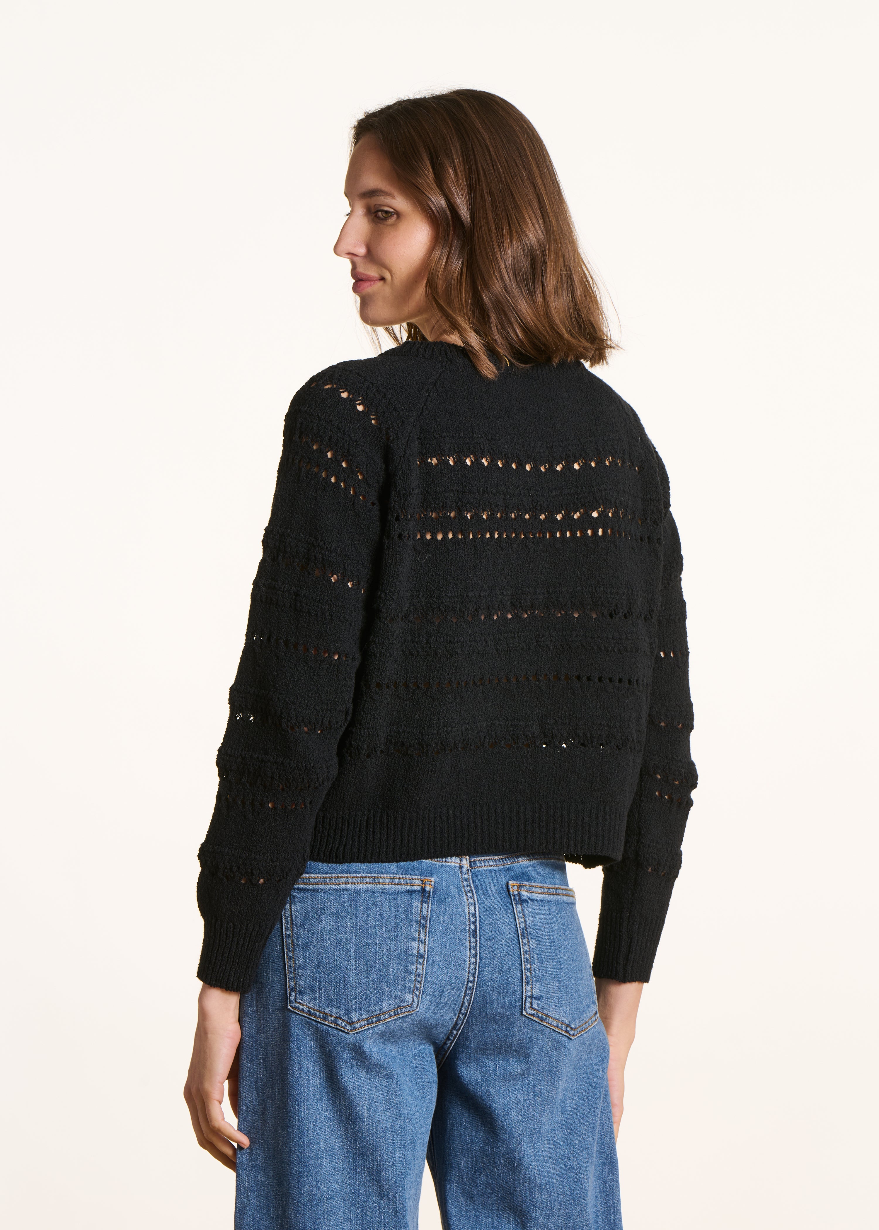 Black openwork knit sweater with long sleeves