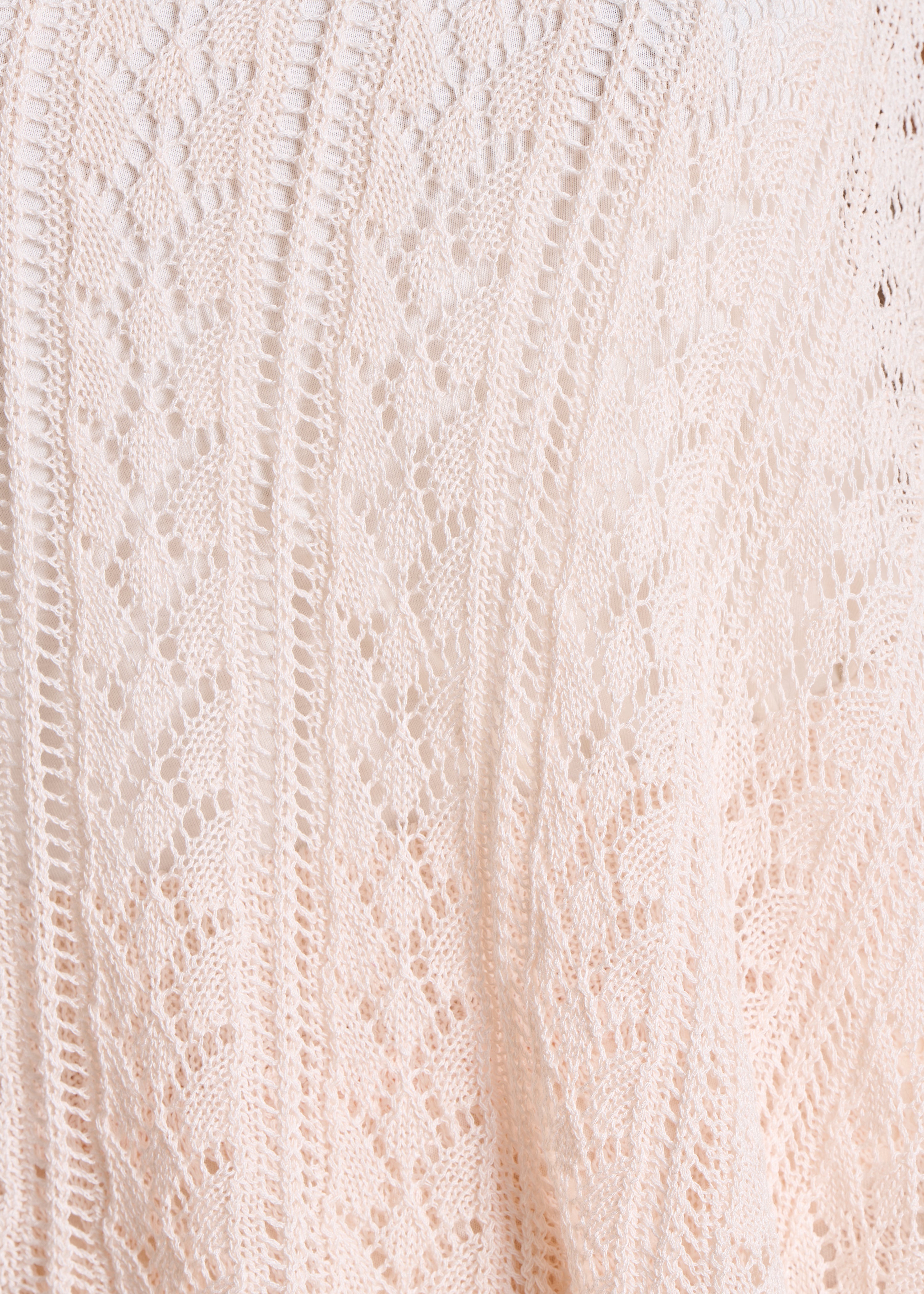 Ecru cape sweater in fine openwork knit