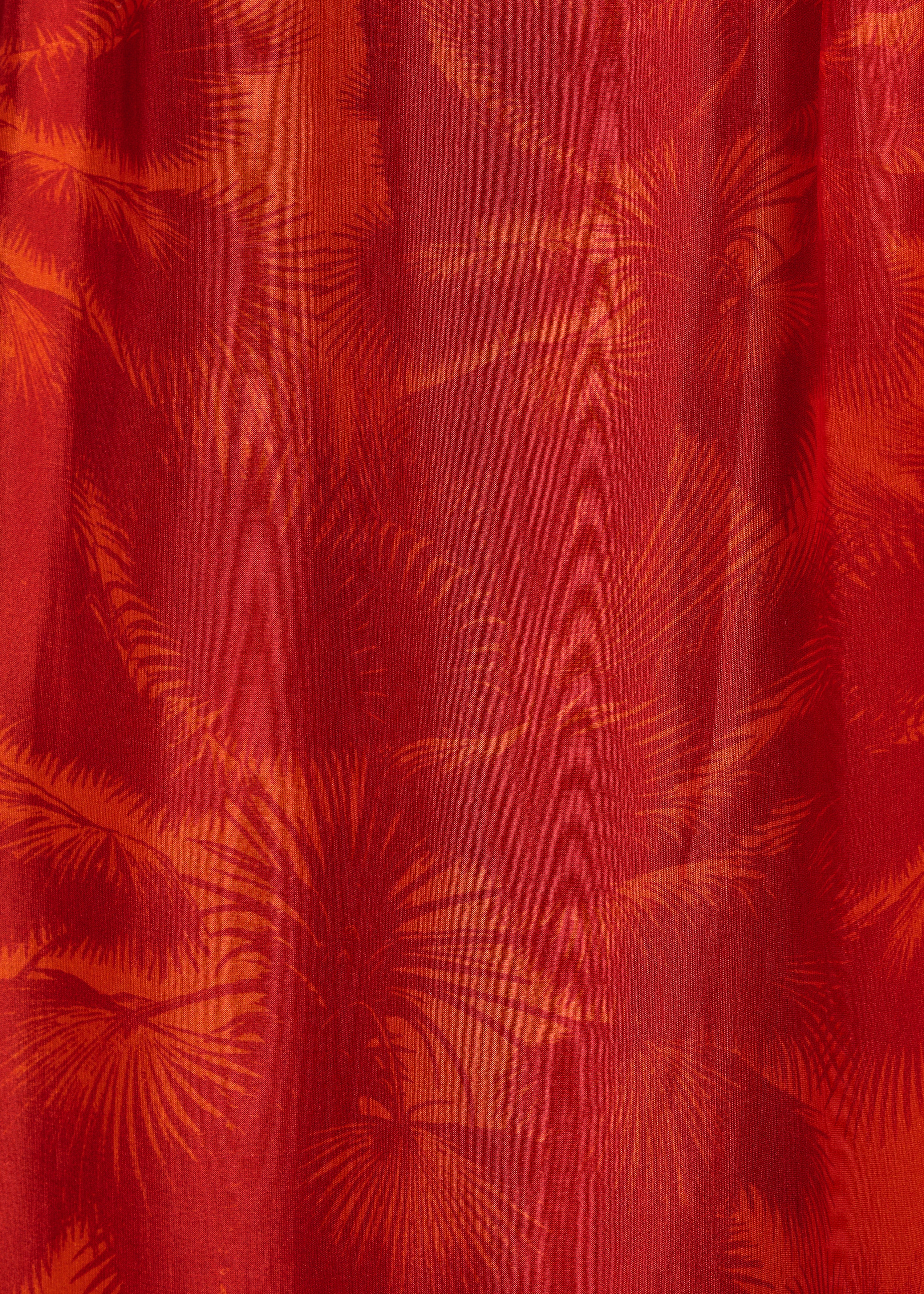 Robe longue orange en voile à imprimé fleuri