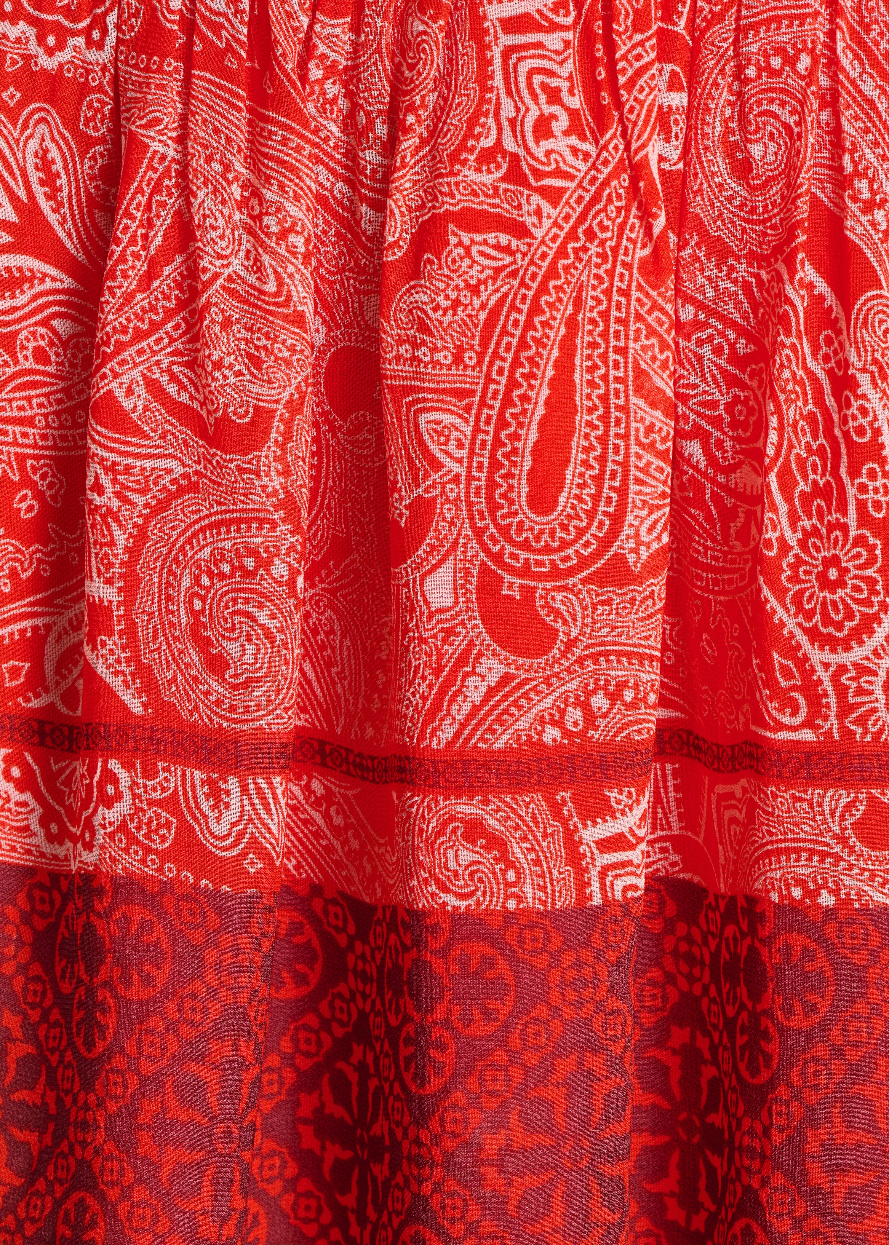 Short fluid orange dress with print