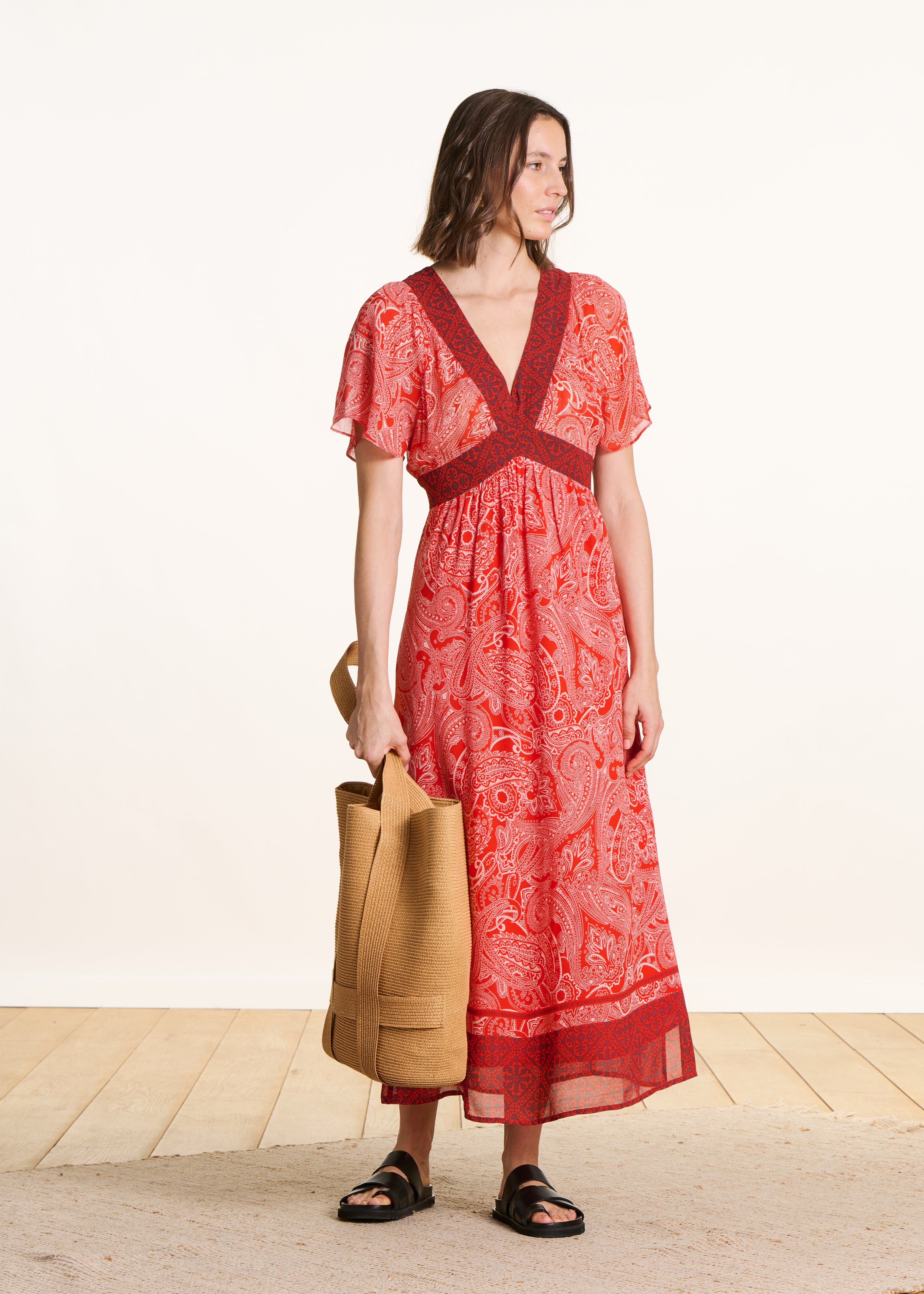 Long fluid orange dress with print