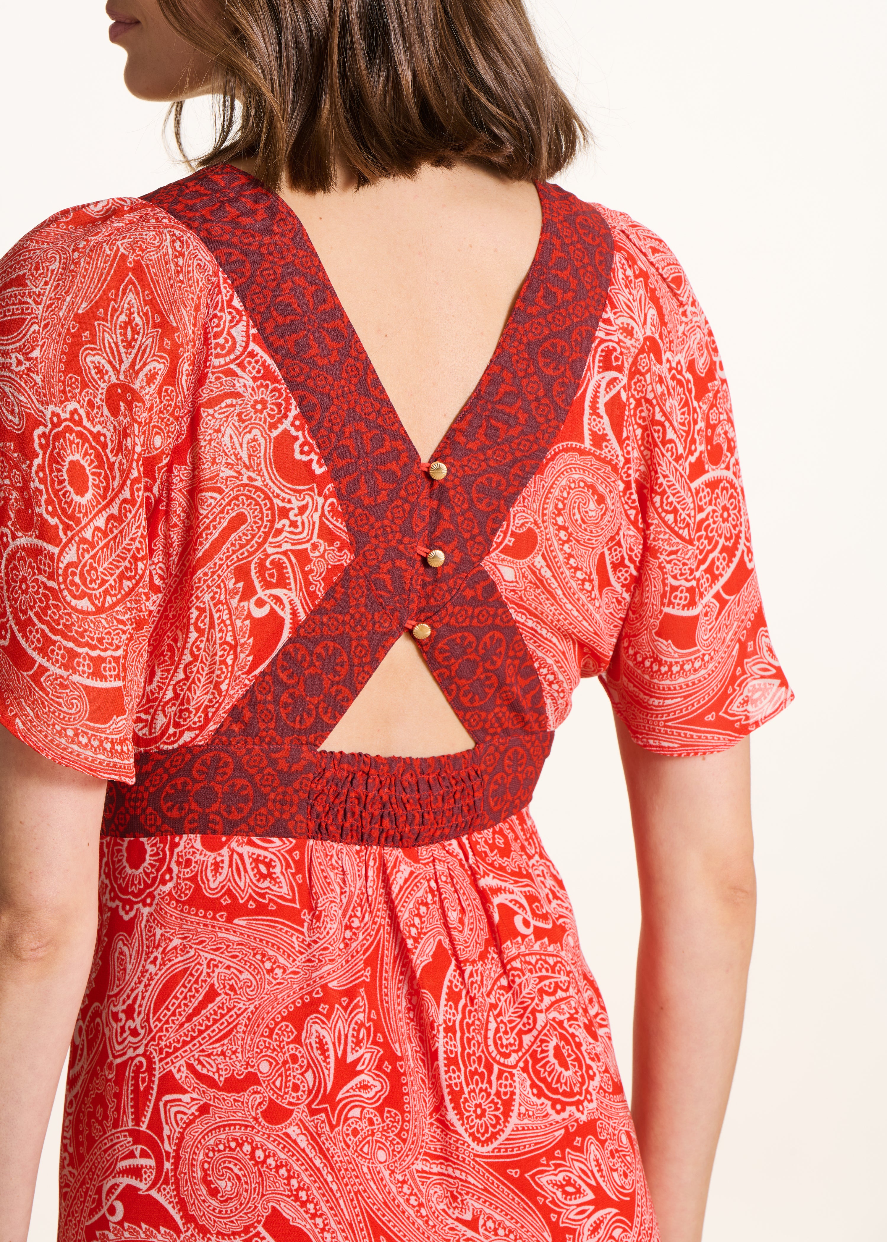 Long fluid orange dress with print