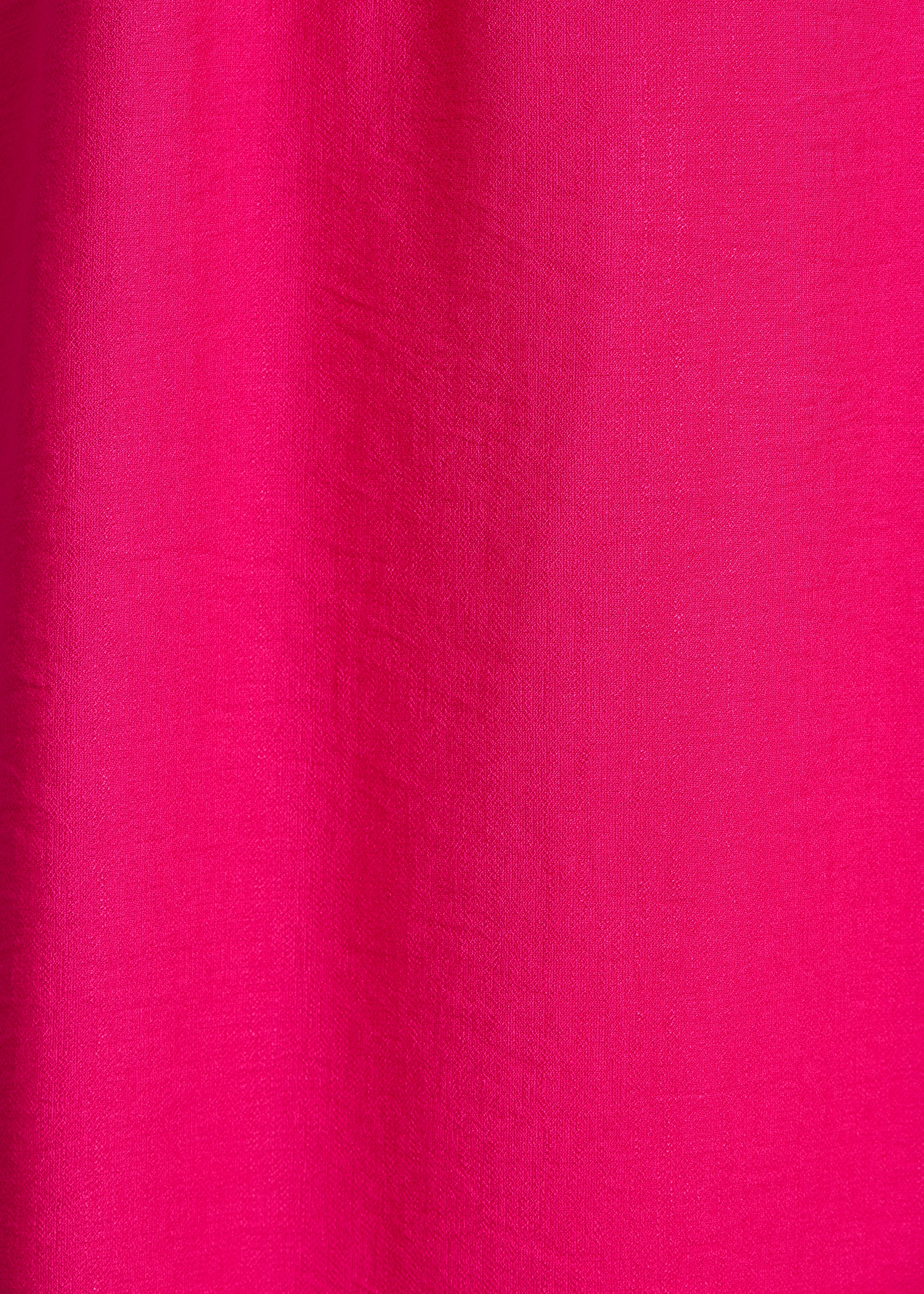 Fitted long dress in fuchsia pink with wrap front