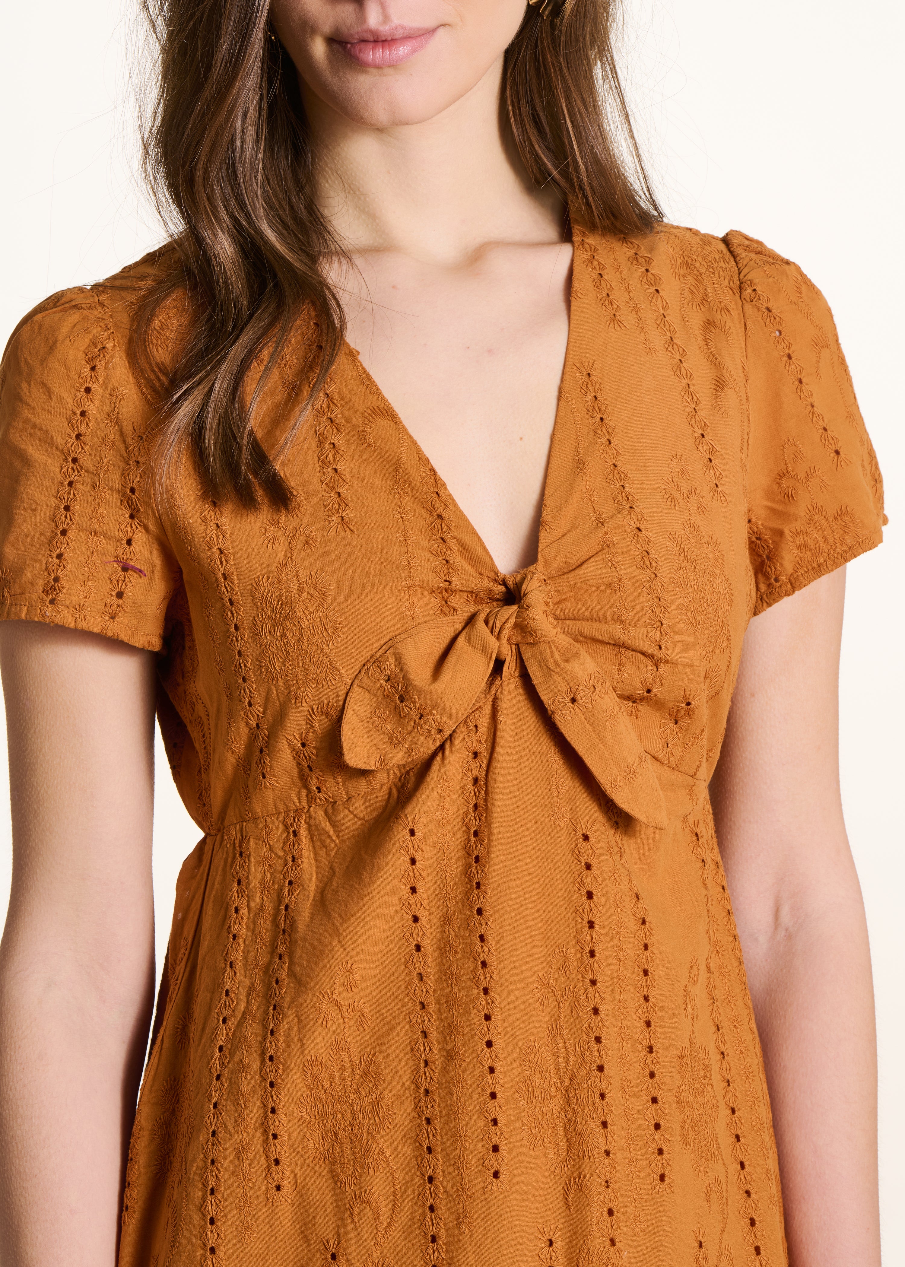 Mid-length ochre dress in eyelet embroidery