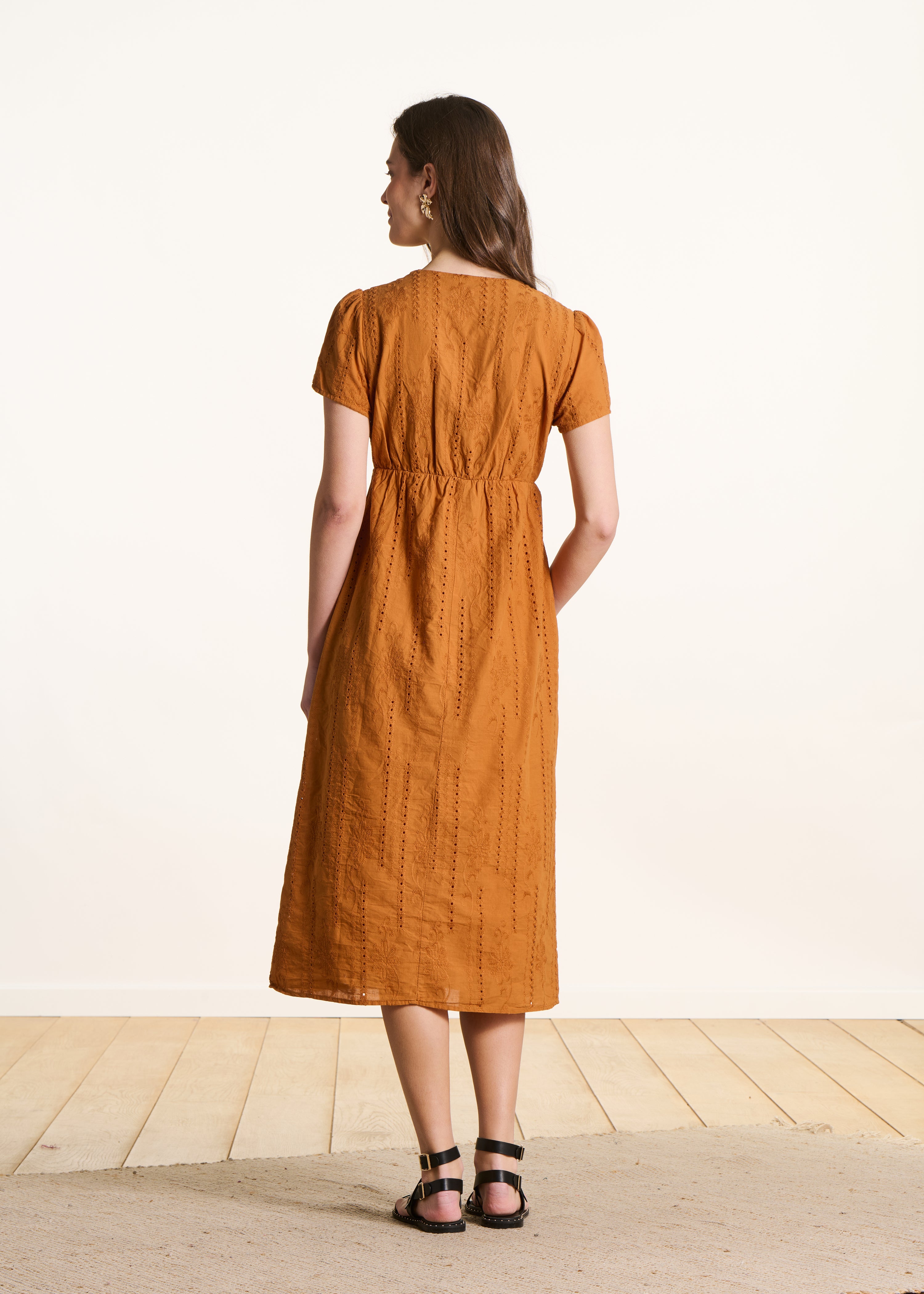 Mid-length ochre dress in eyelet embroidery
