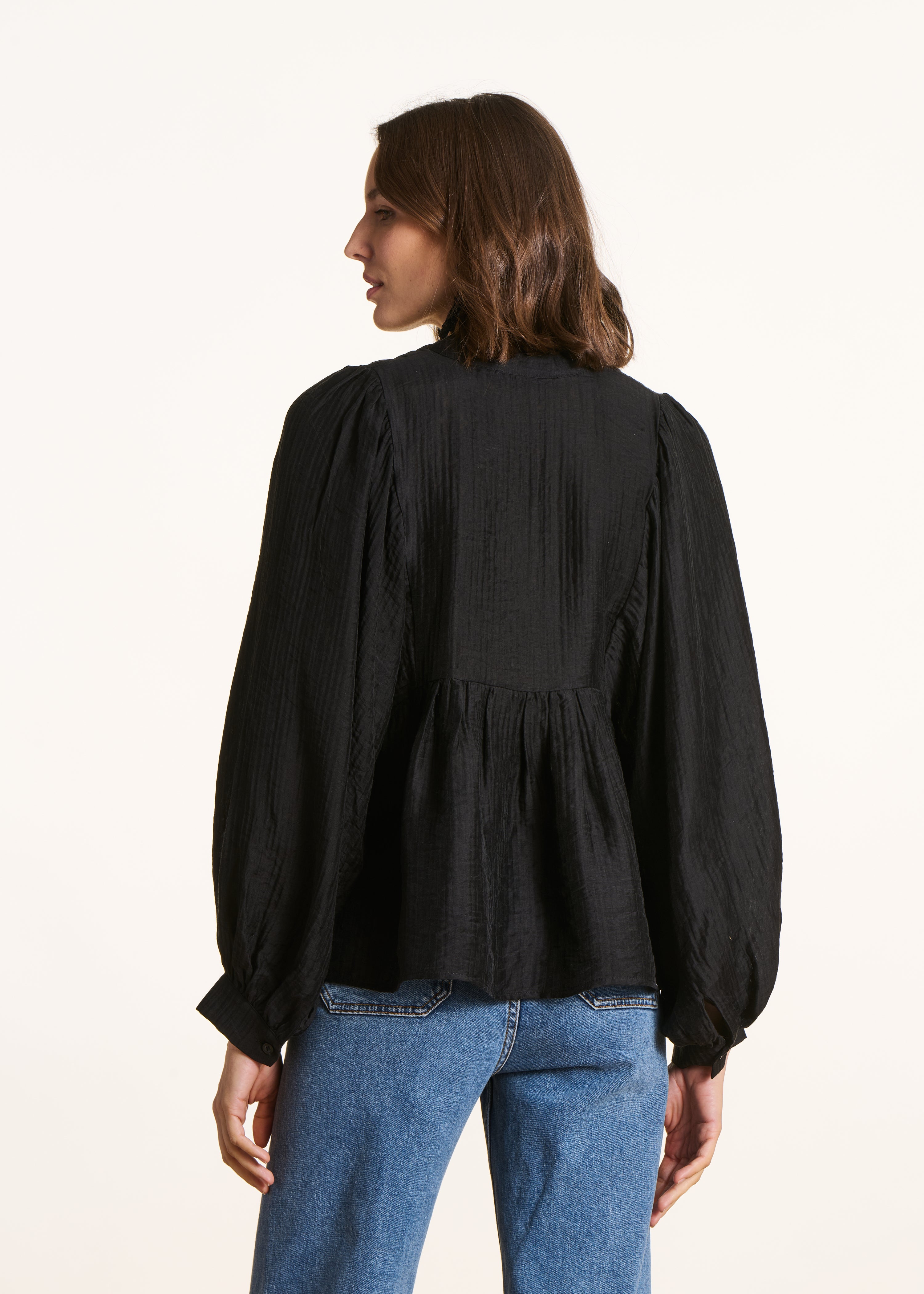 Zwarte wijde top met lange mouwen