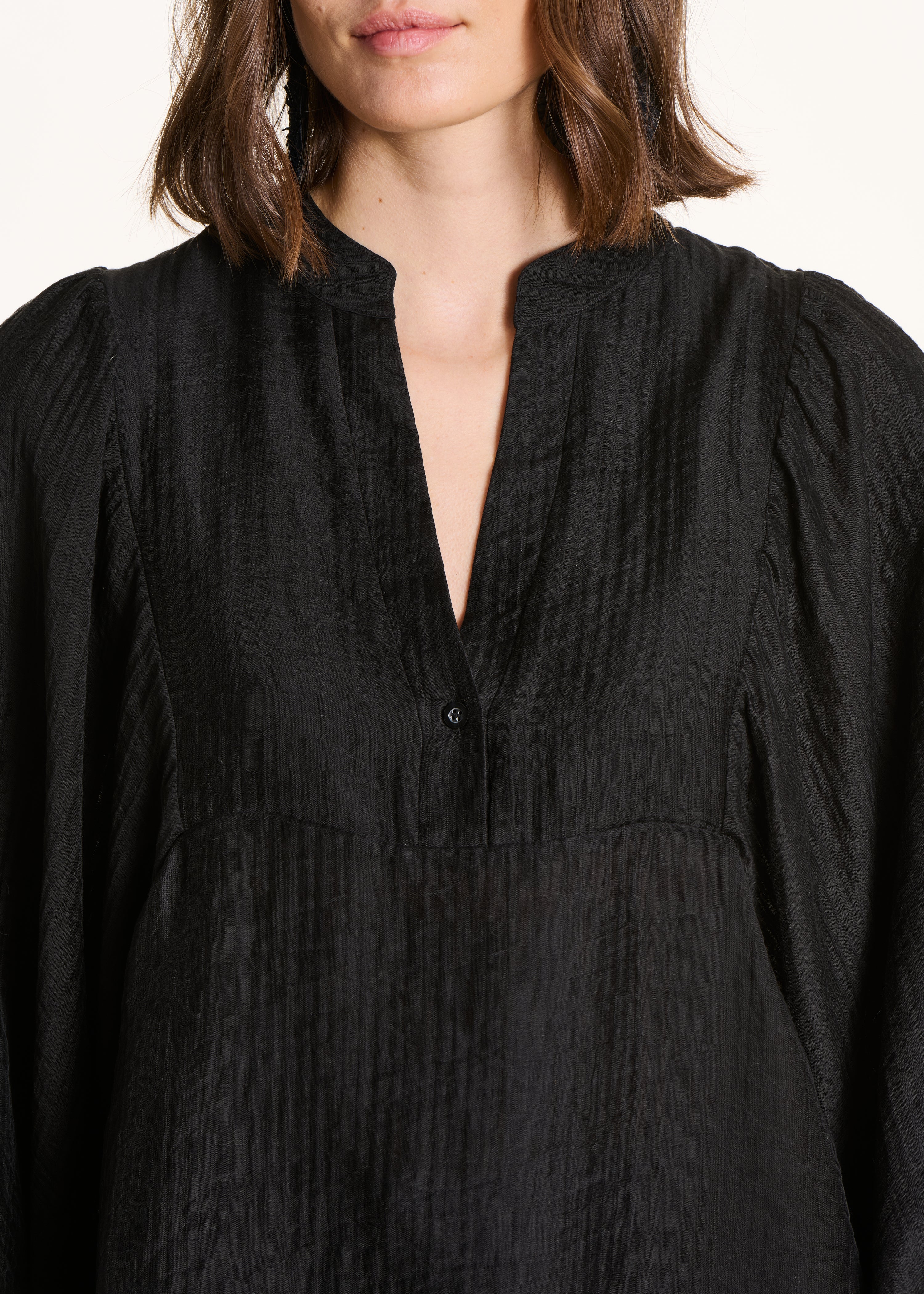 Zwarte wijde top met lange mouwen