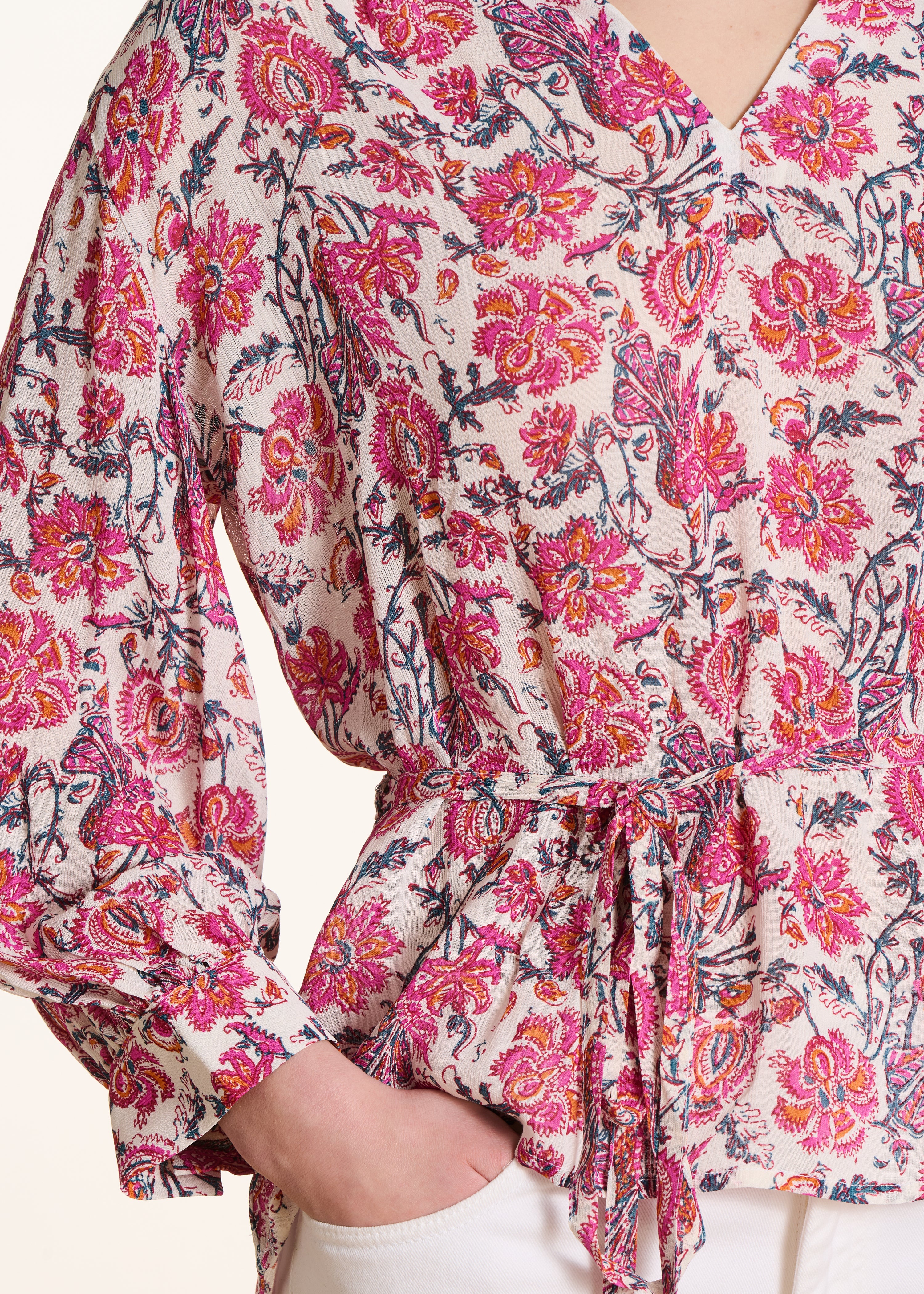 Top ample rose à imprimé floral manches longues