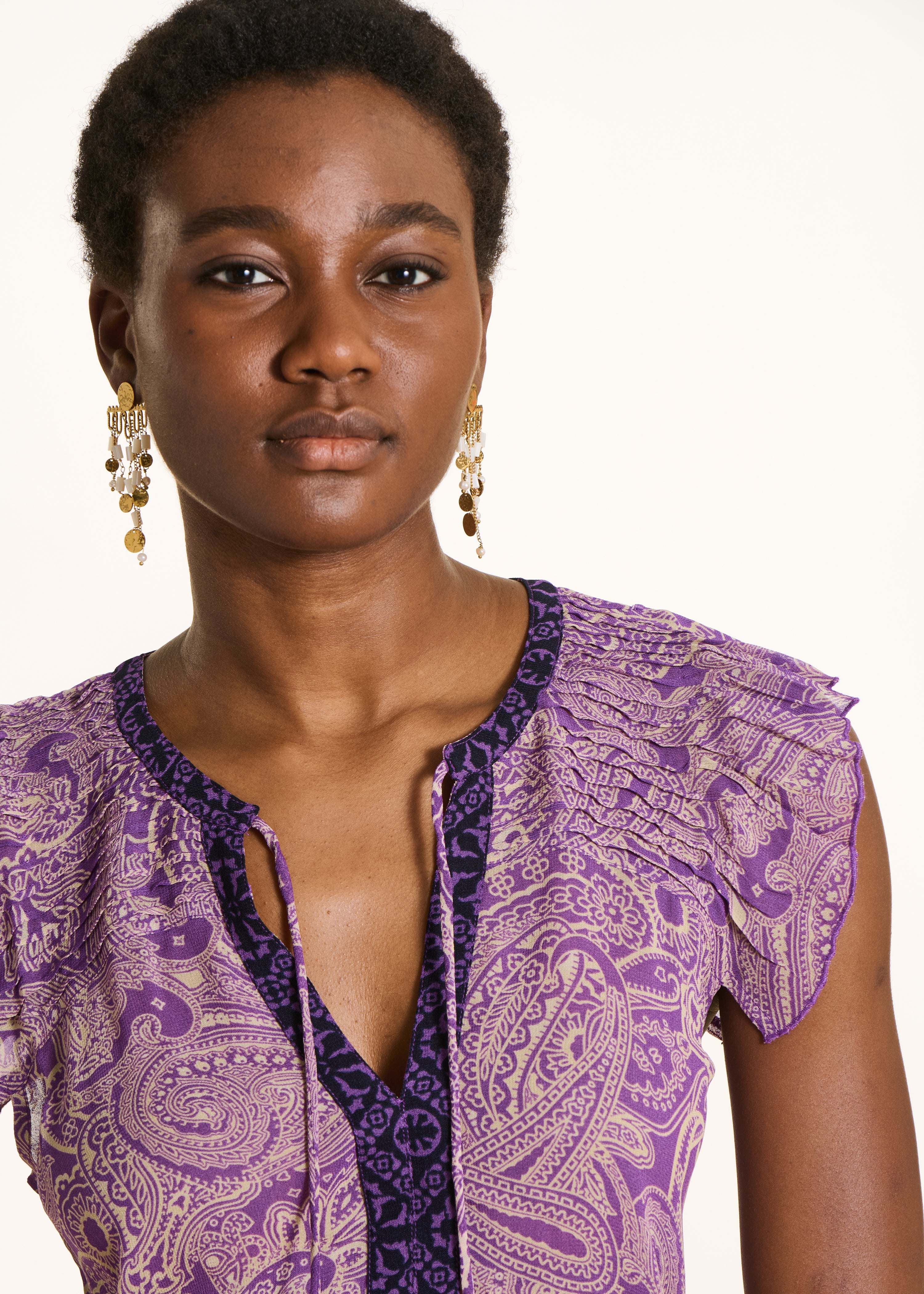 Mouwloze top van paarse voile met print