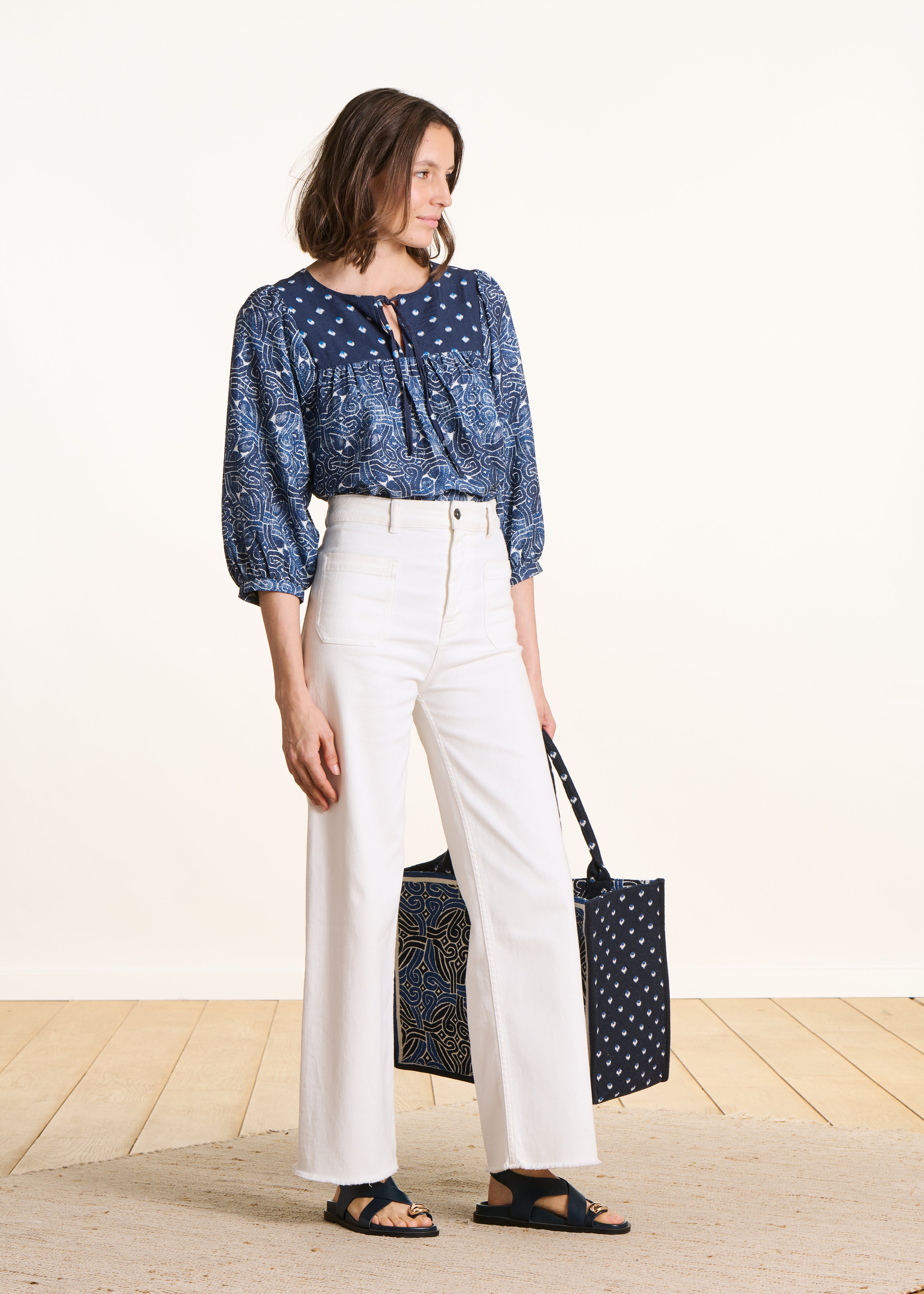 Blauwe top met patchworkprint en 3/4 mouwen