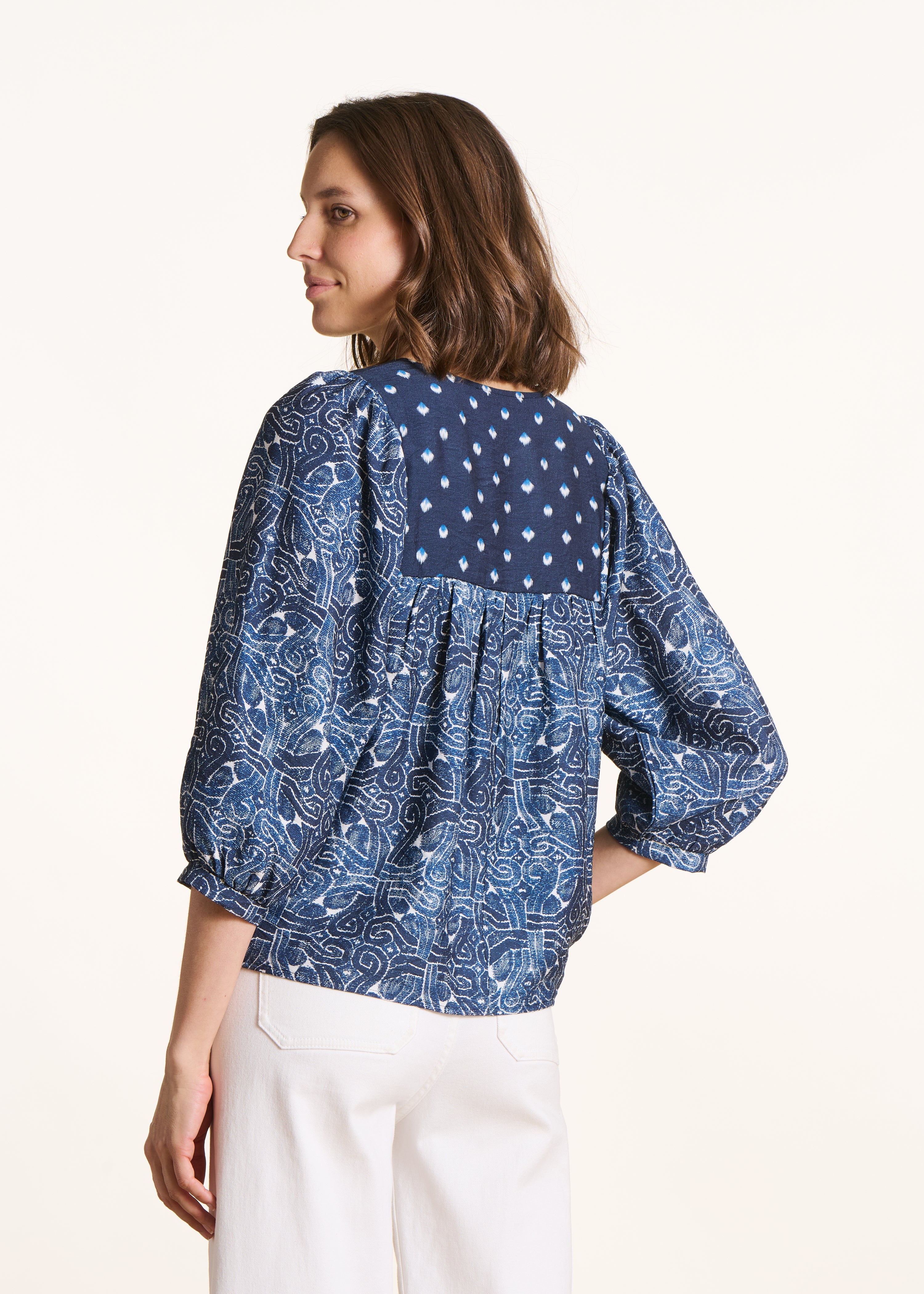 Blauwe top met patchworkprint en 3/4 mouwen