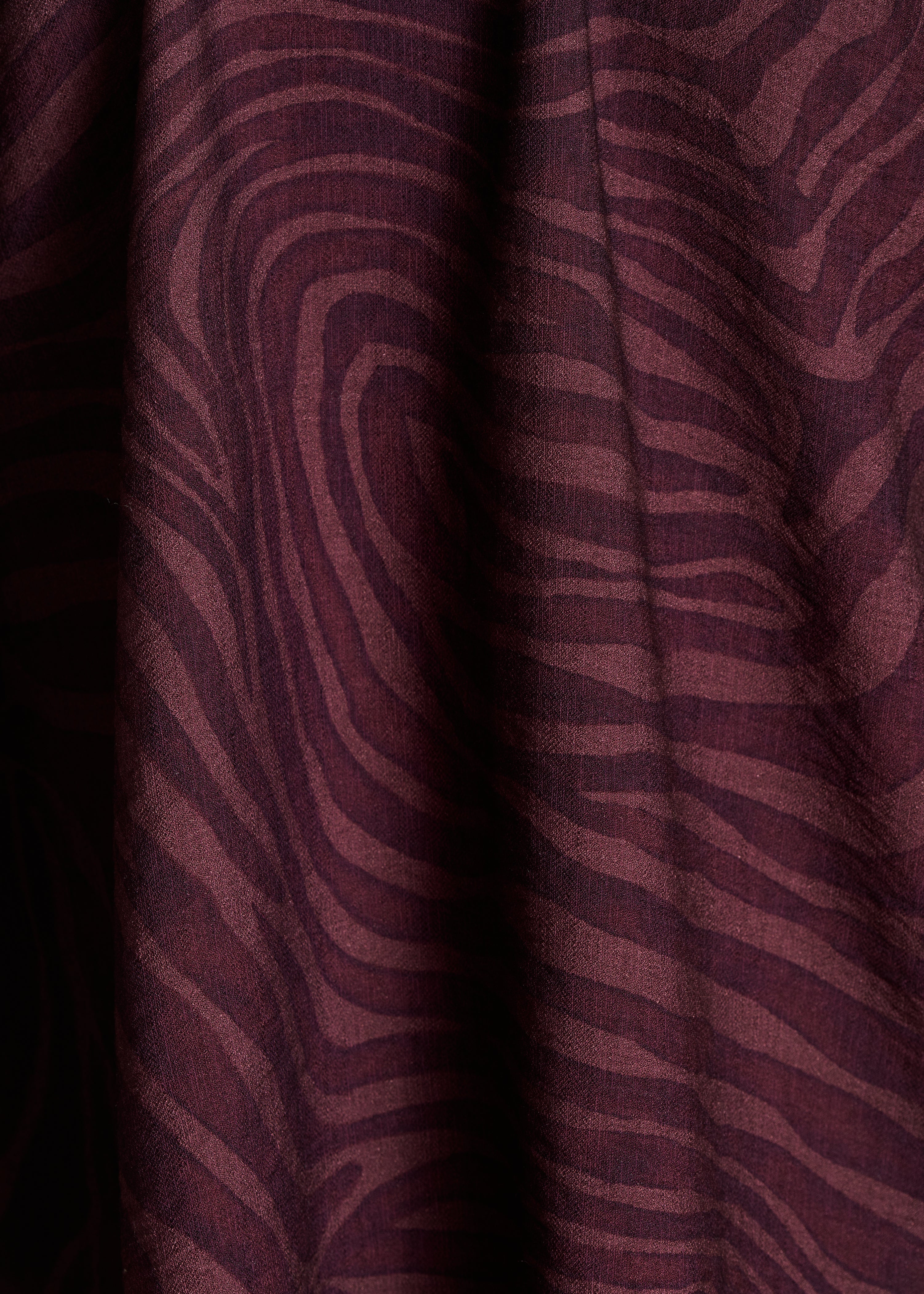 Blusa marrón oversize con estampado animal print