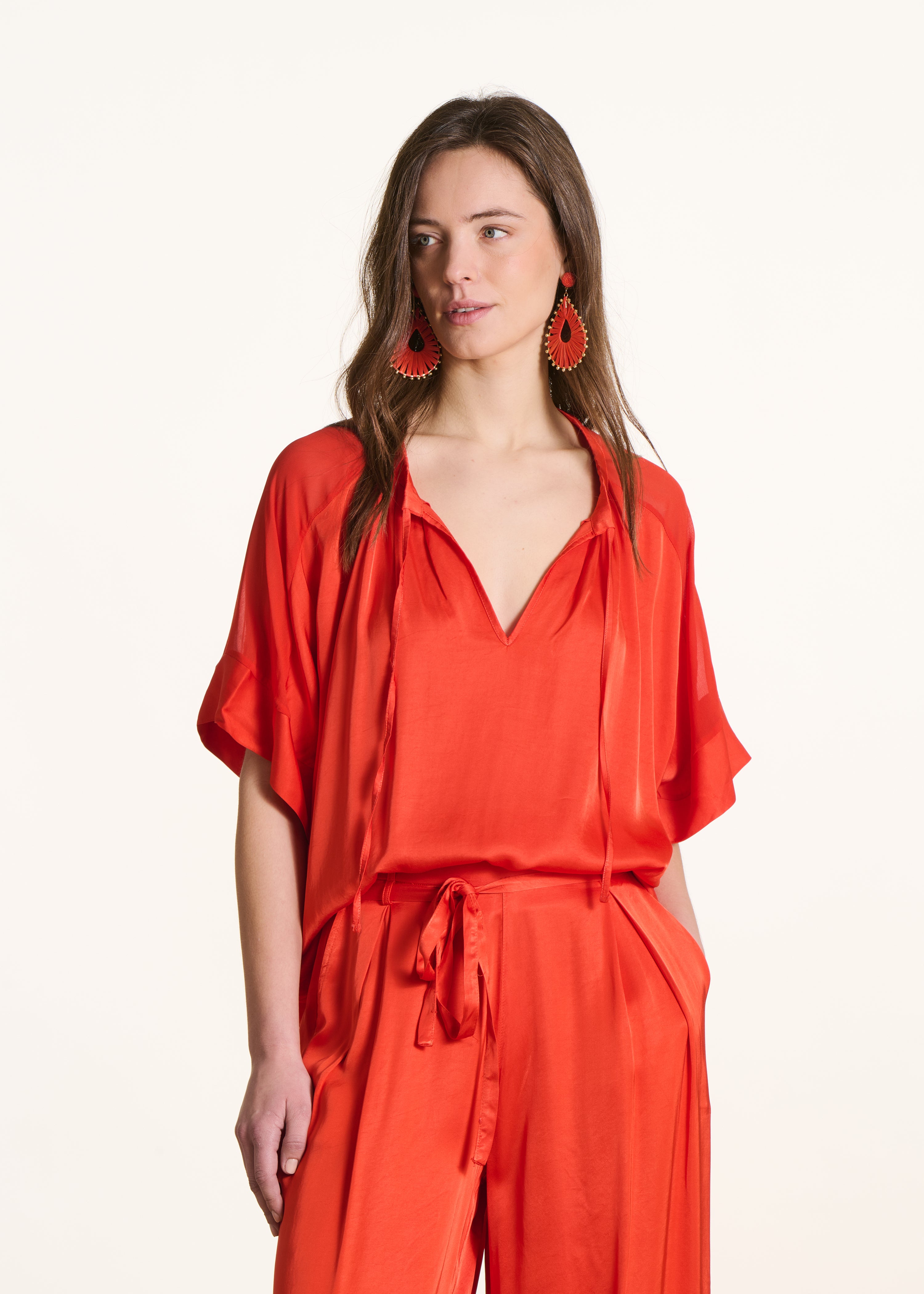 Blouse orange ample encolure tunisienne