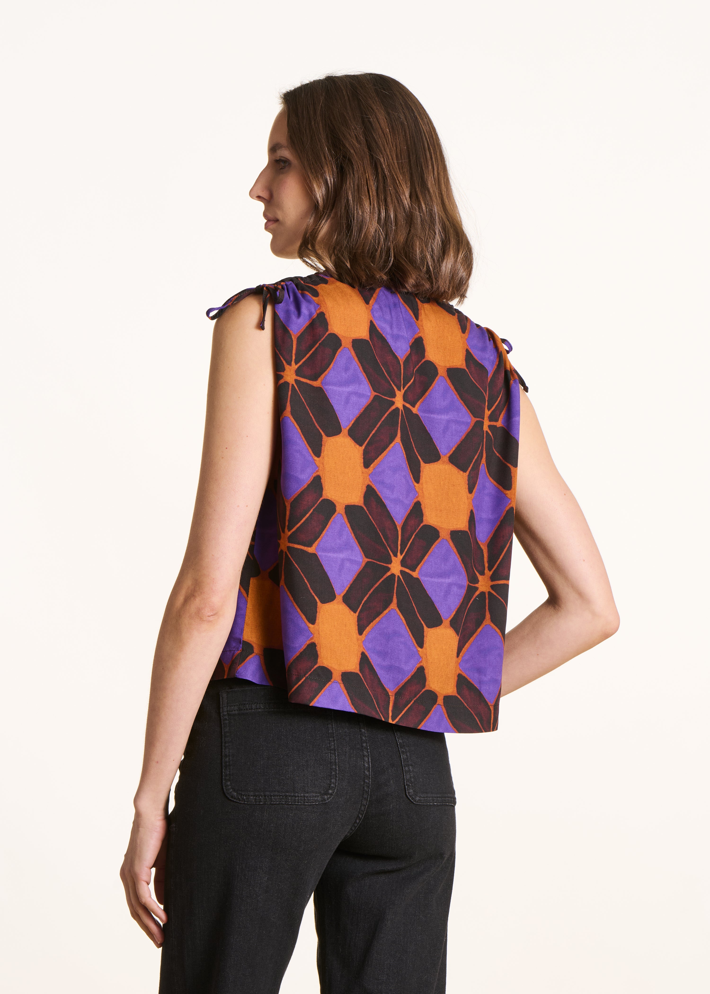 Top senza maniche stampato arancione e viola