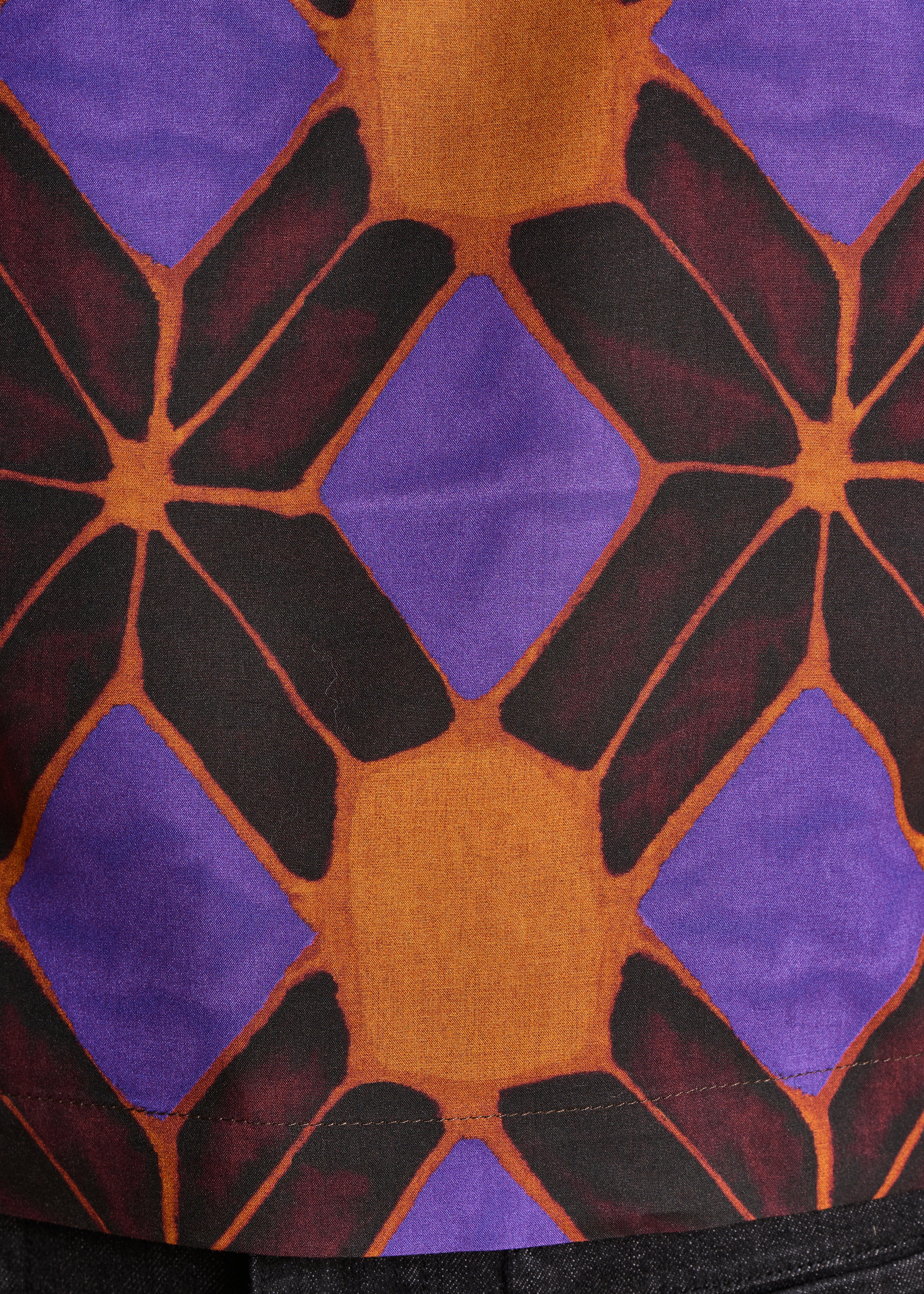 Top senza maniche stampato arancione e viola