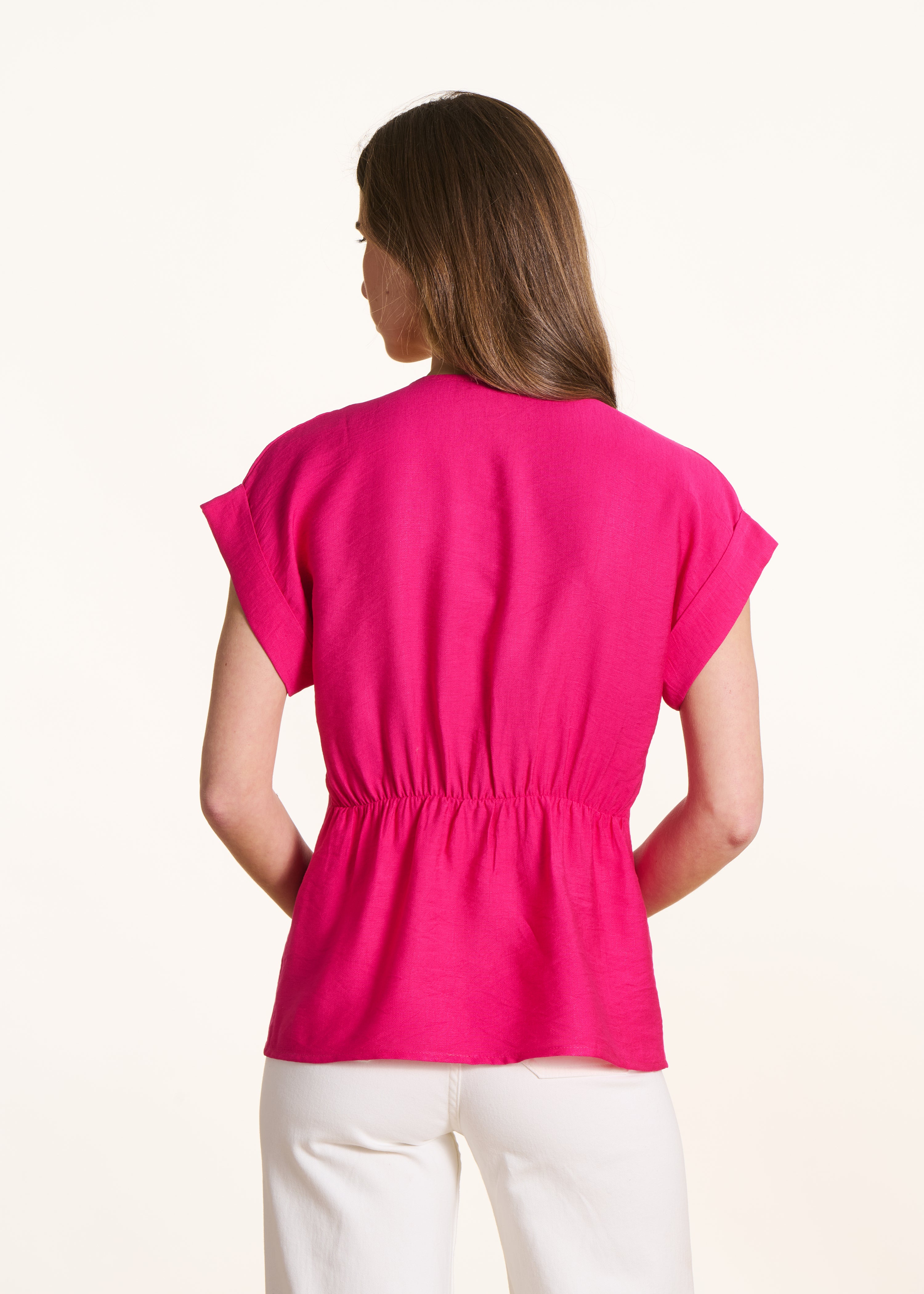 Top rosa fucsia de manga corta