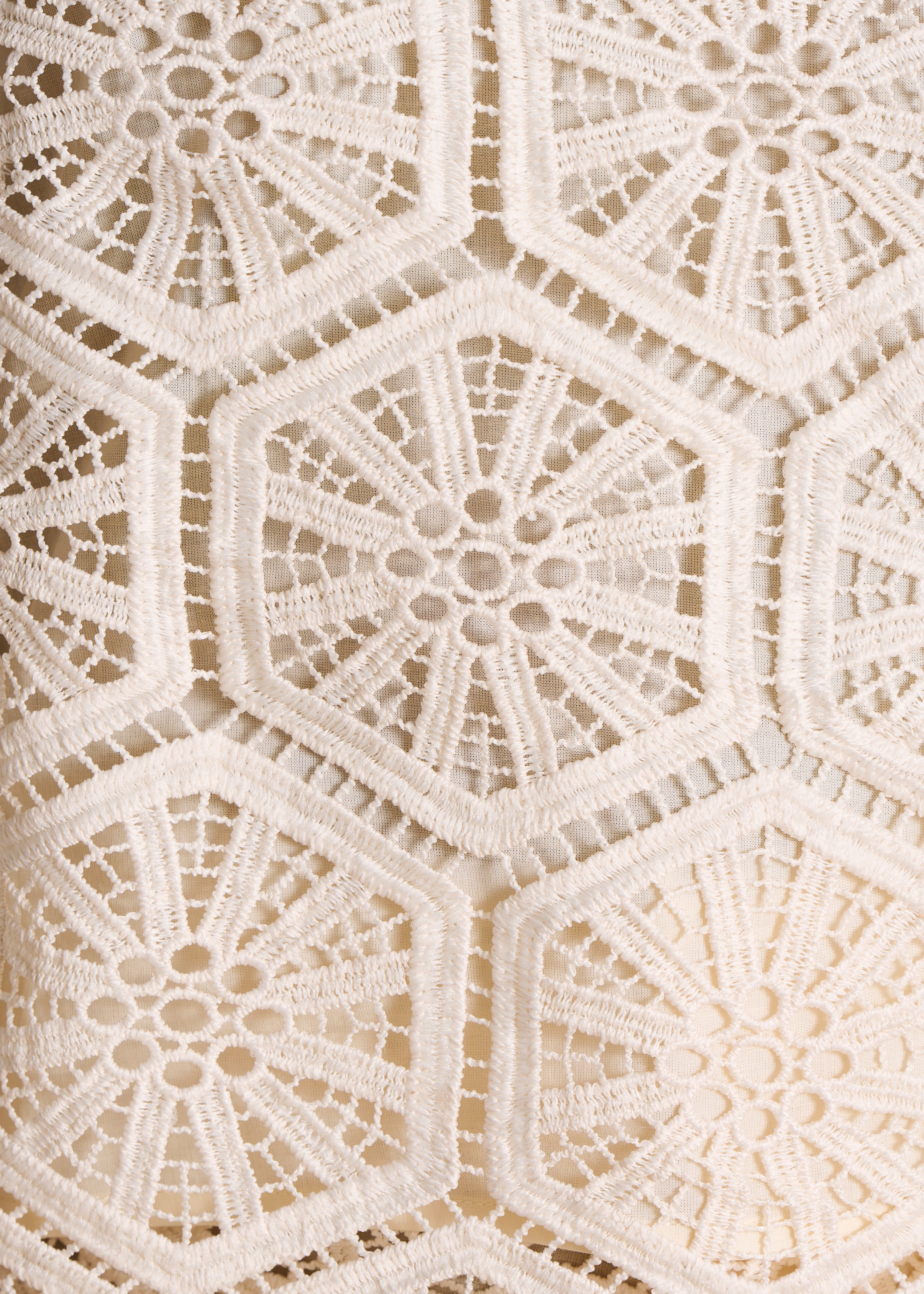 Top en dentelle écru sans manches