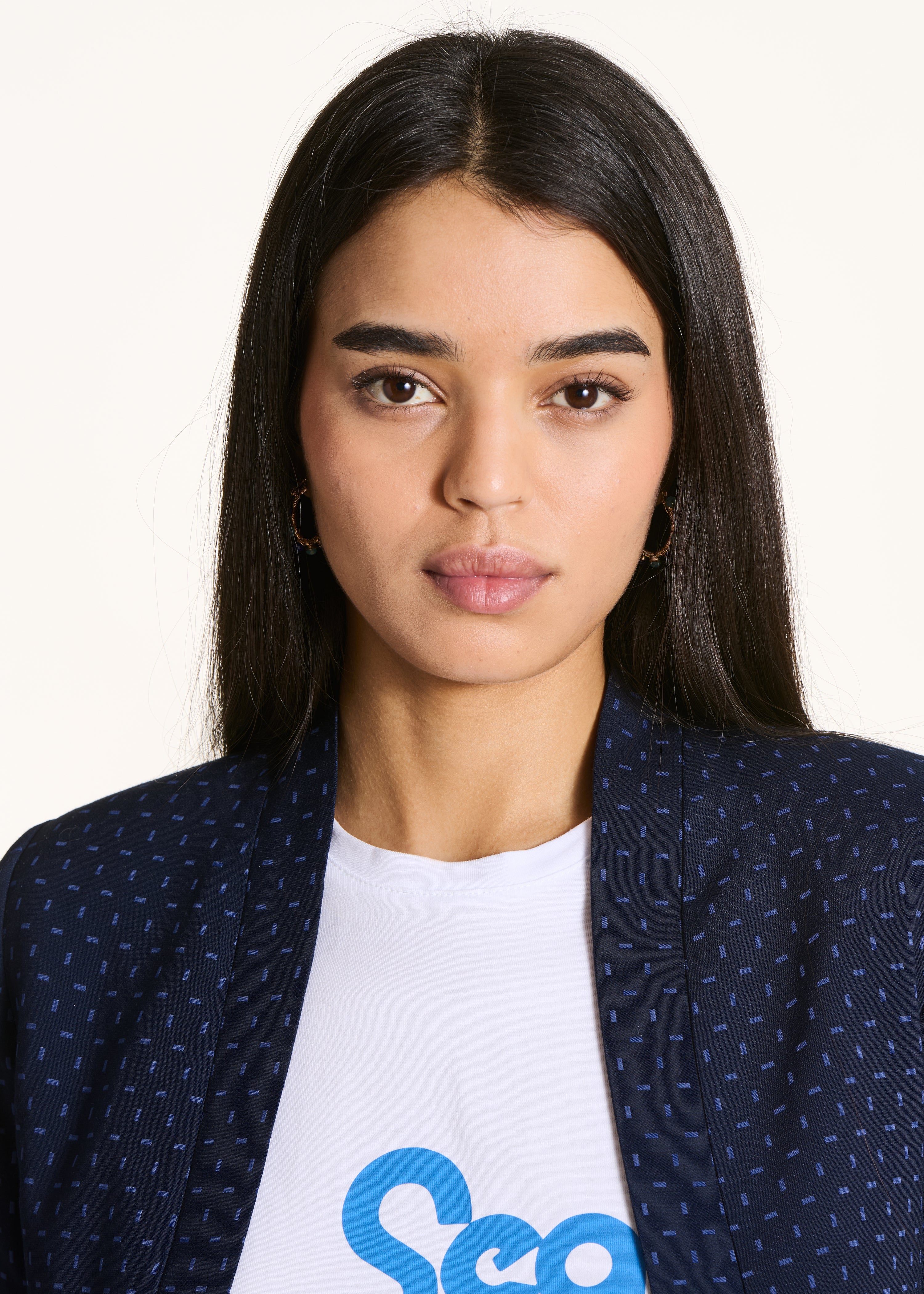 Short jacket in blue jacquard