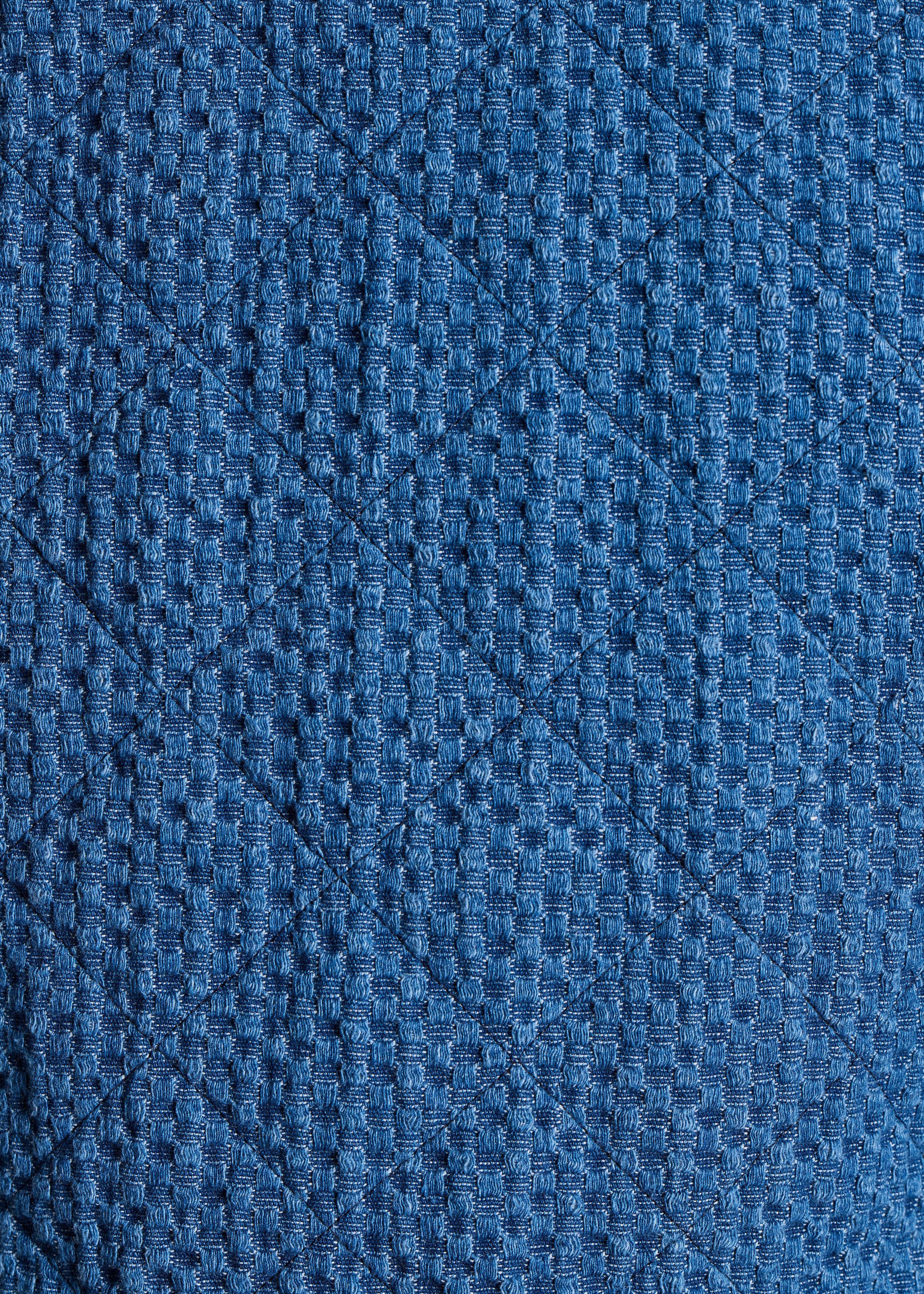 Short jacket in embossed denim