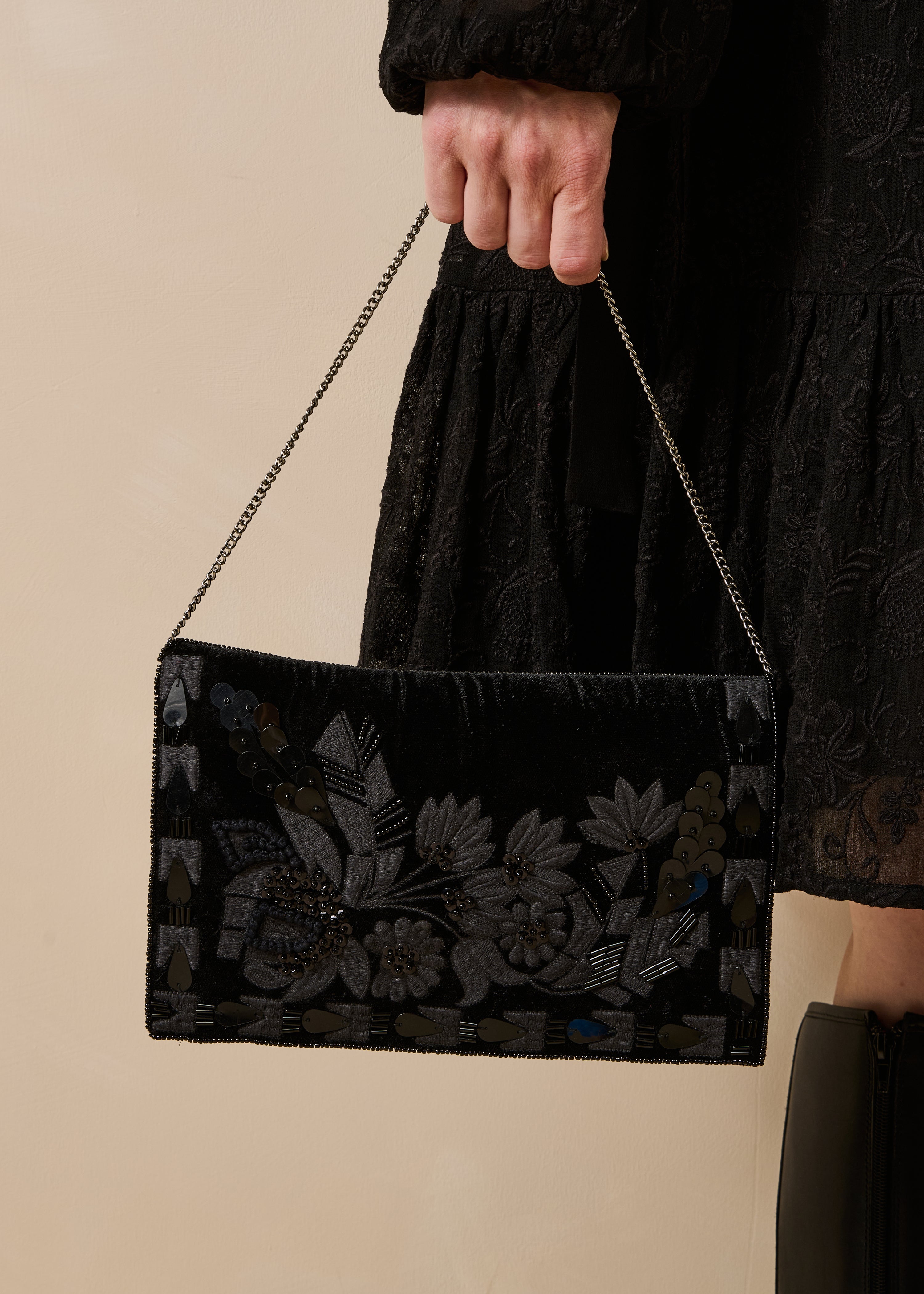 Black shoulder bag with beads