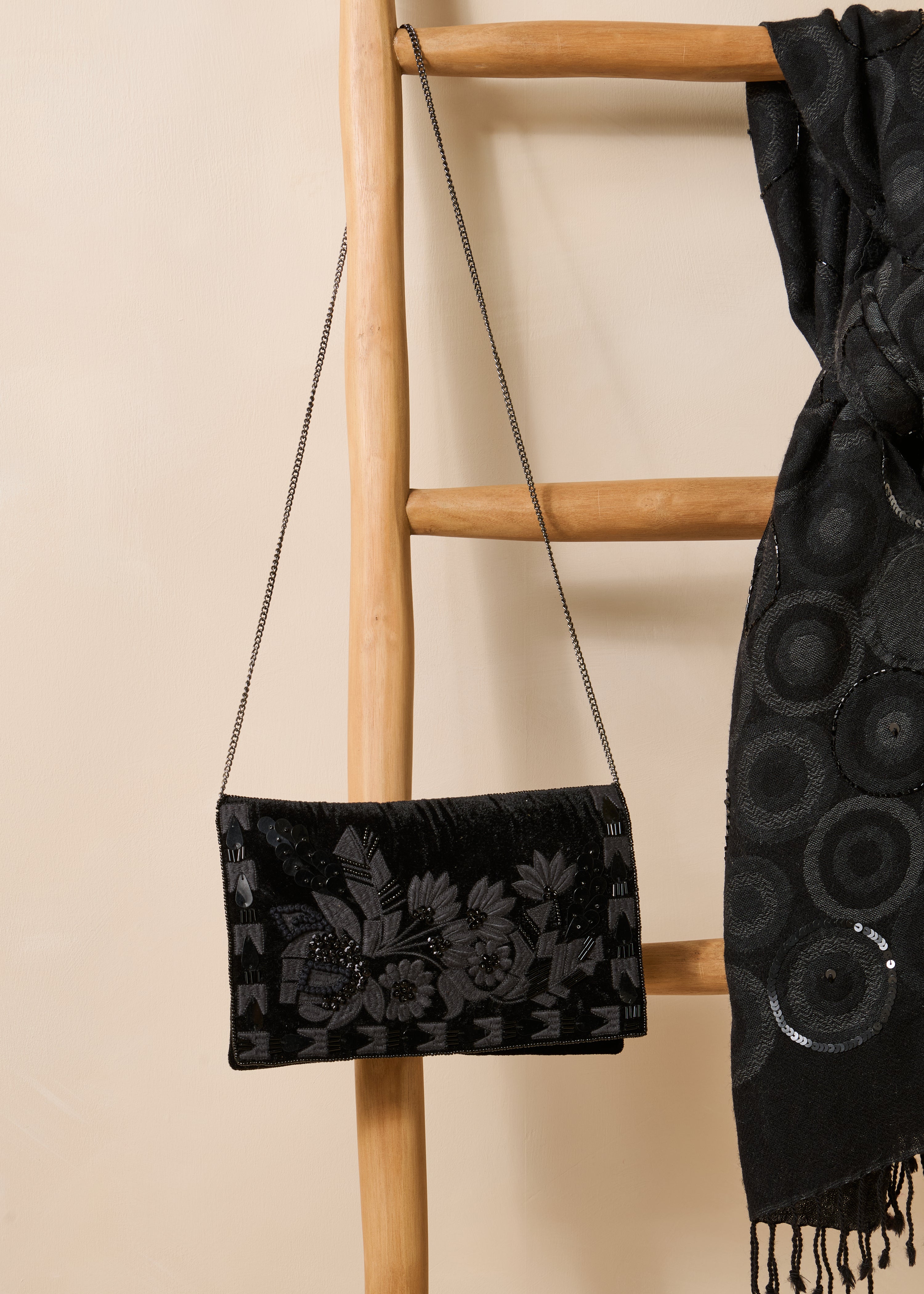 Black shoulder bag with beads
