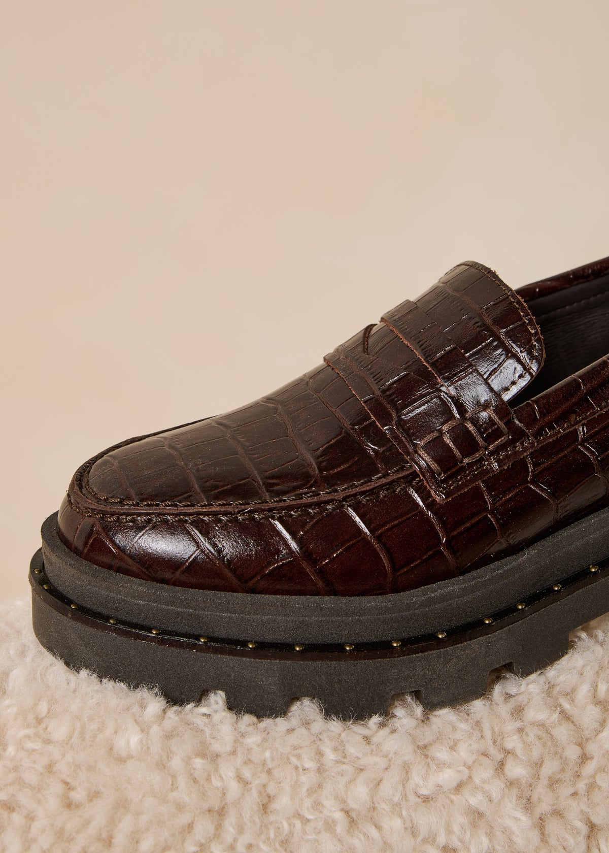 Brown crocodile-effect leather loafers