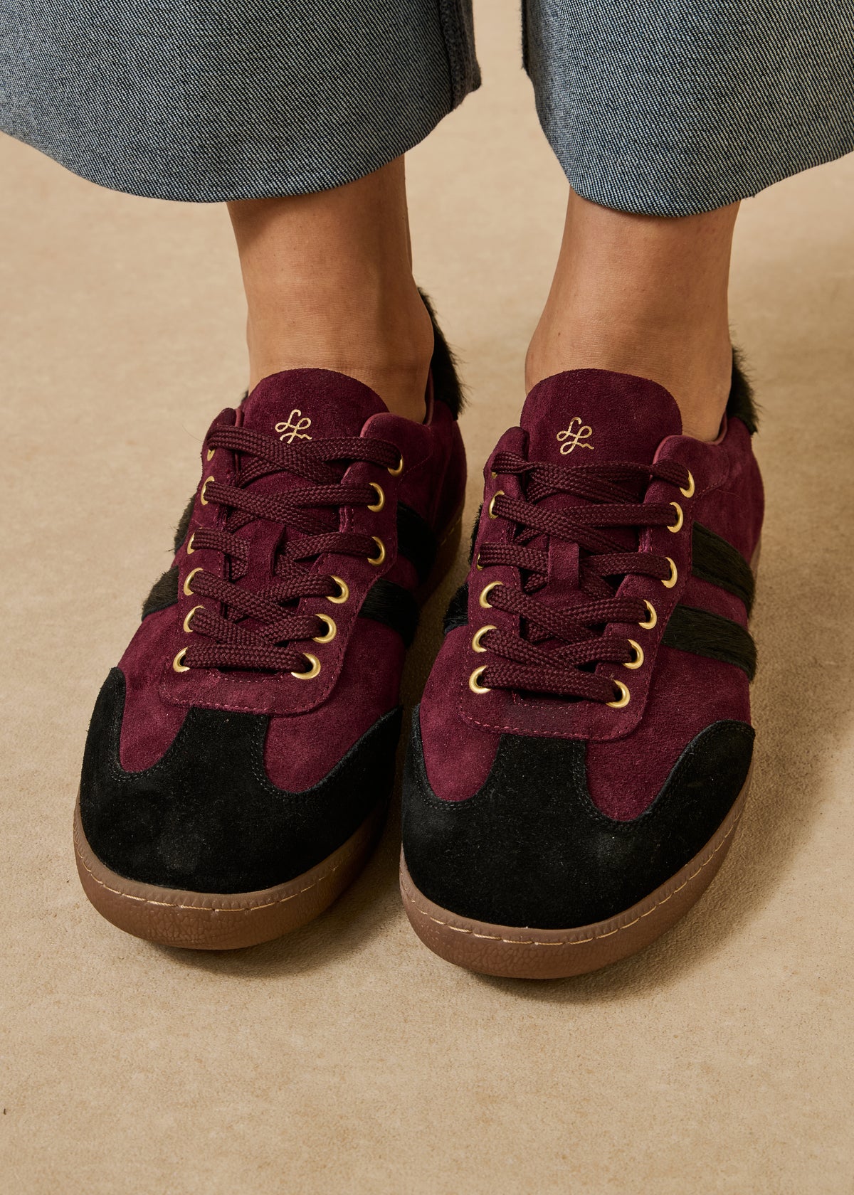Bordeaux and black leather lace-up sneakers