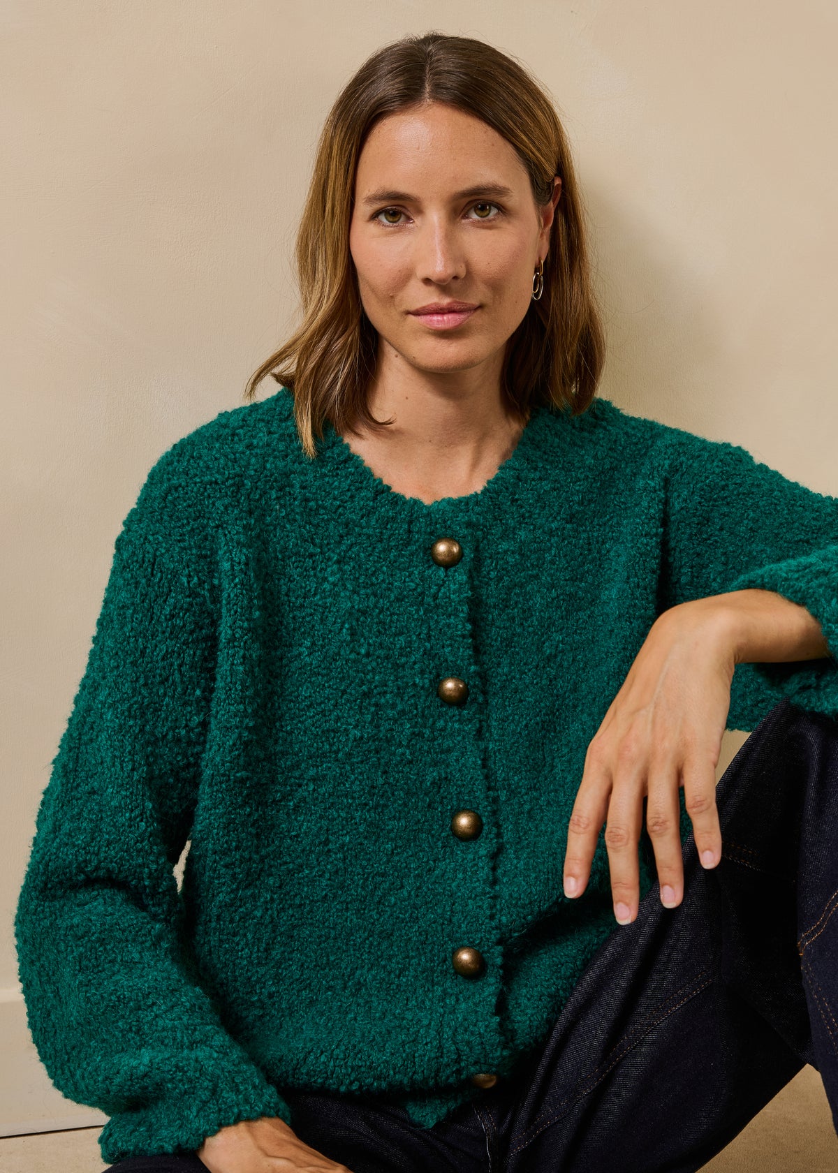 Chaleco verde de punto bouclé con cuello redondo