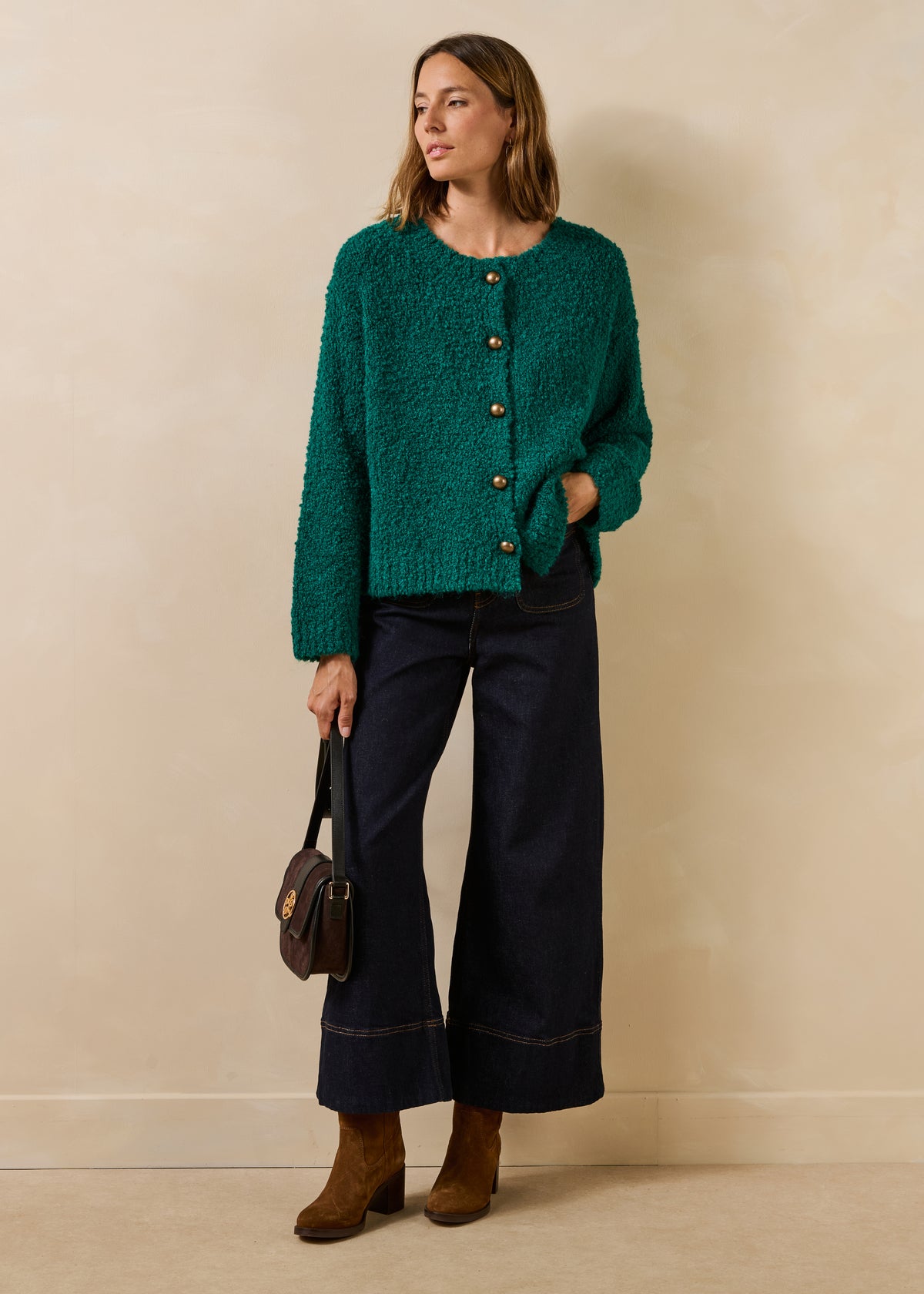 Chaleco verde de punto bouclé con cuello redondo