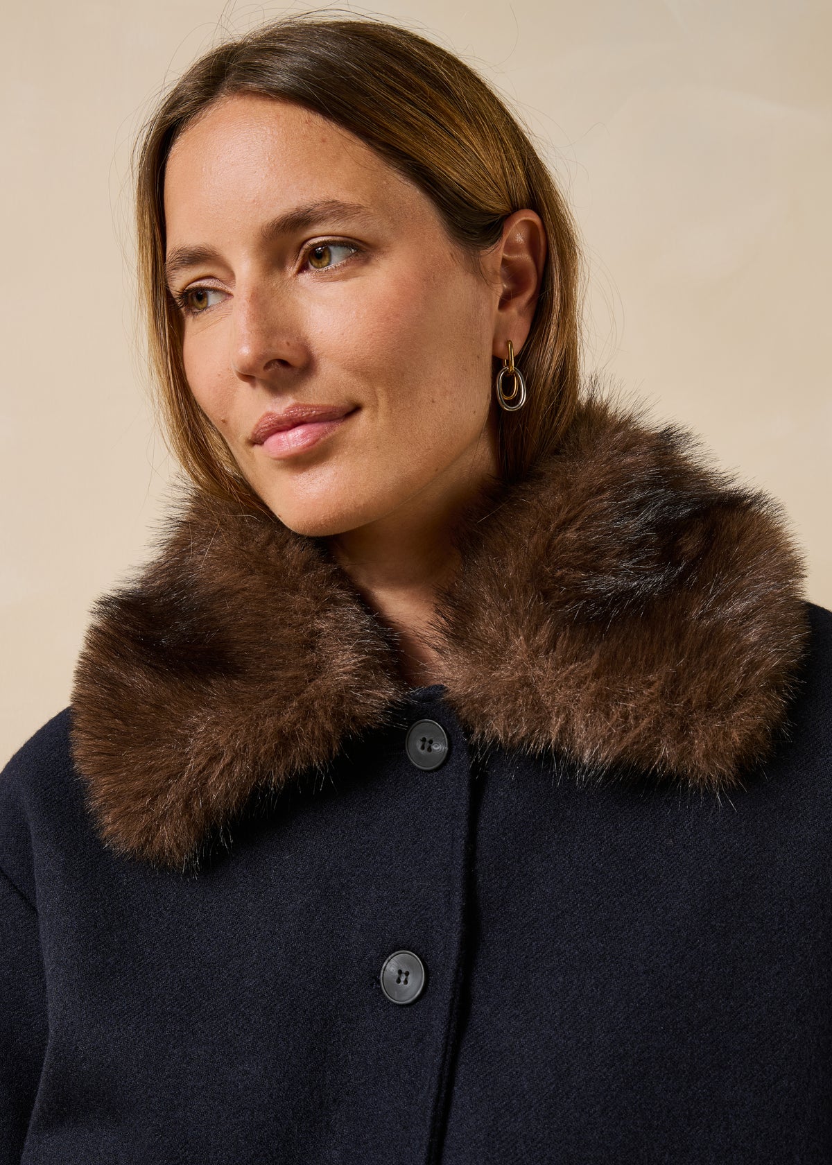 Navy blue jacket with faux fur collar