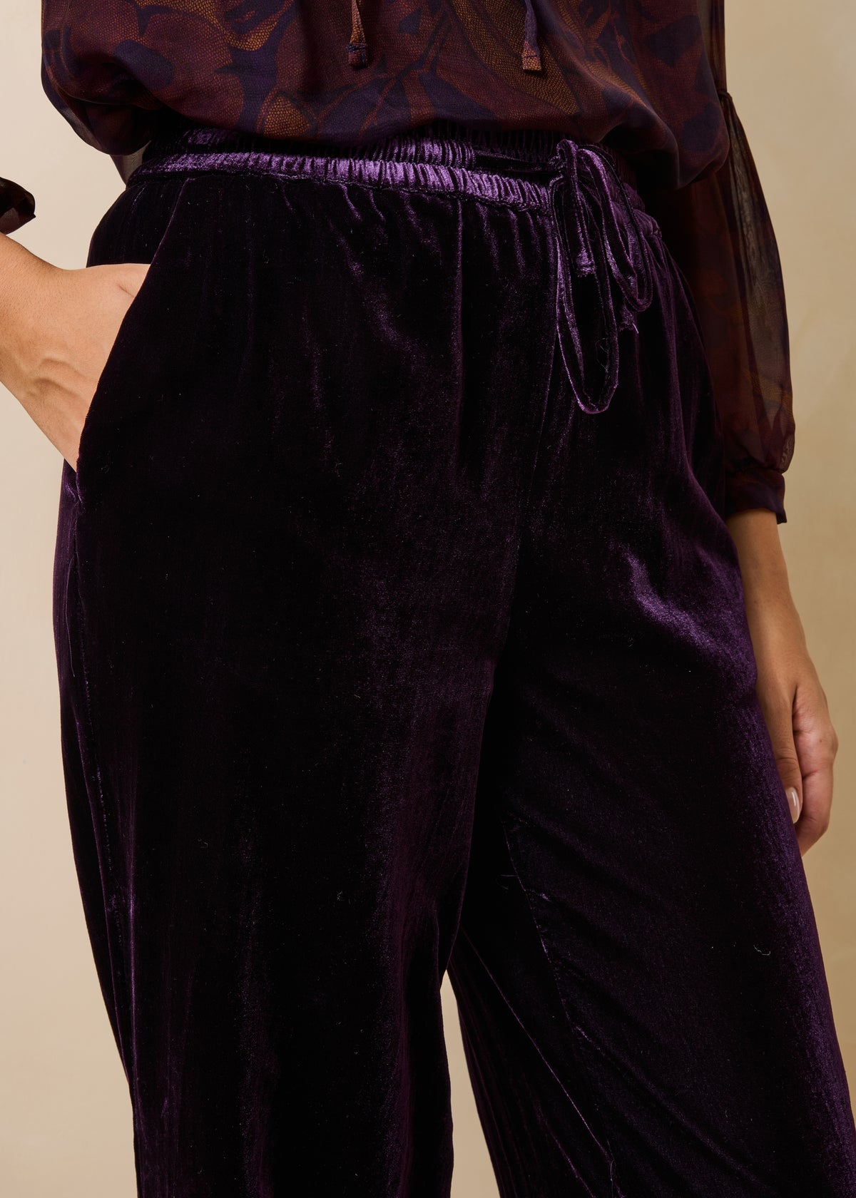Purple wide-leg velvet trousers