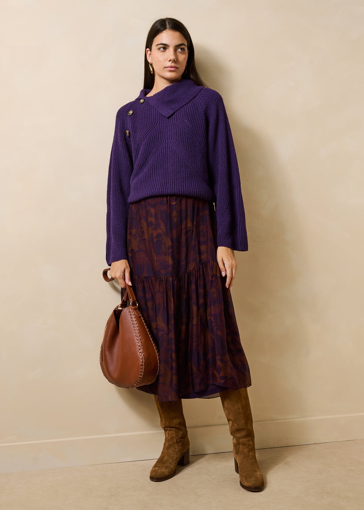 Plum-colored long-sleeve sweater with asymmetrical collar