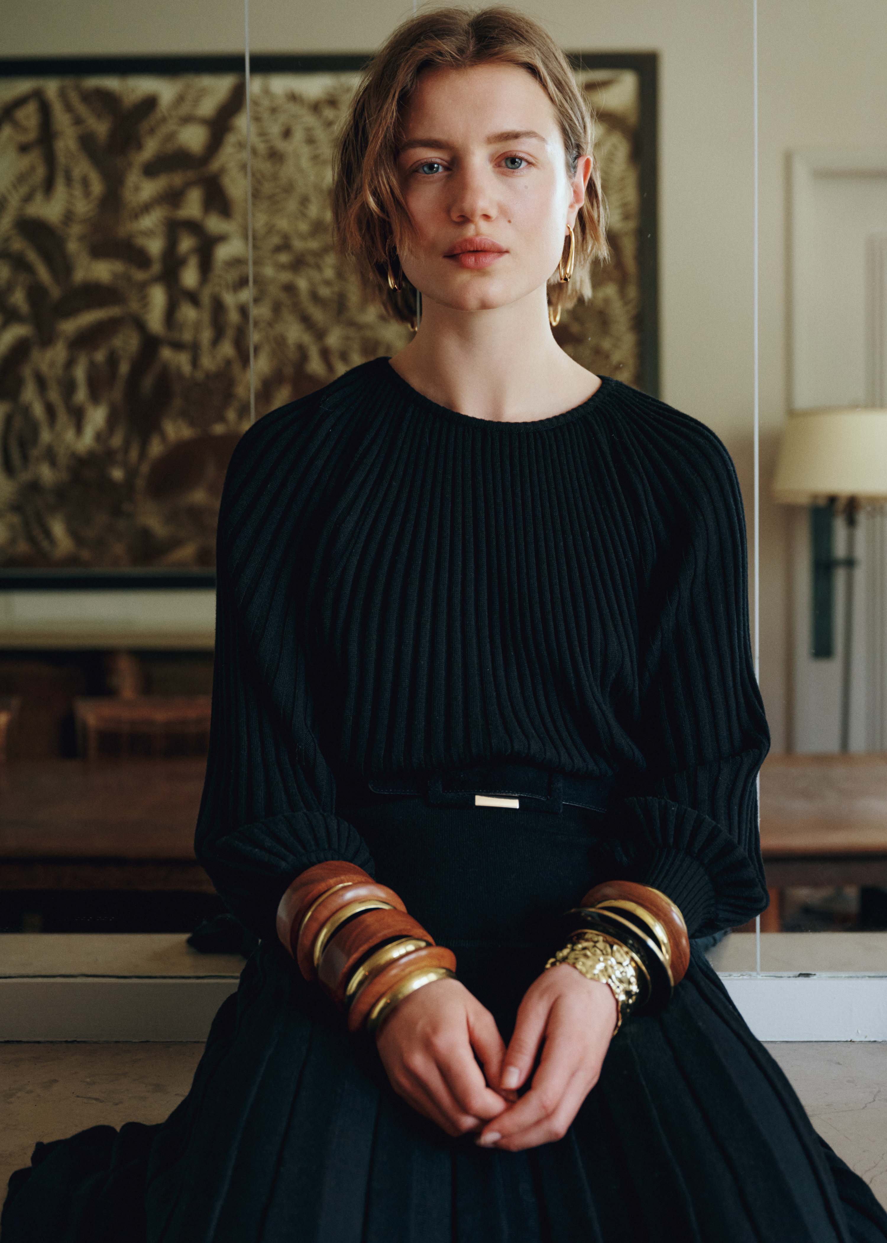 Pull noir en maille plissée manches longues