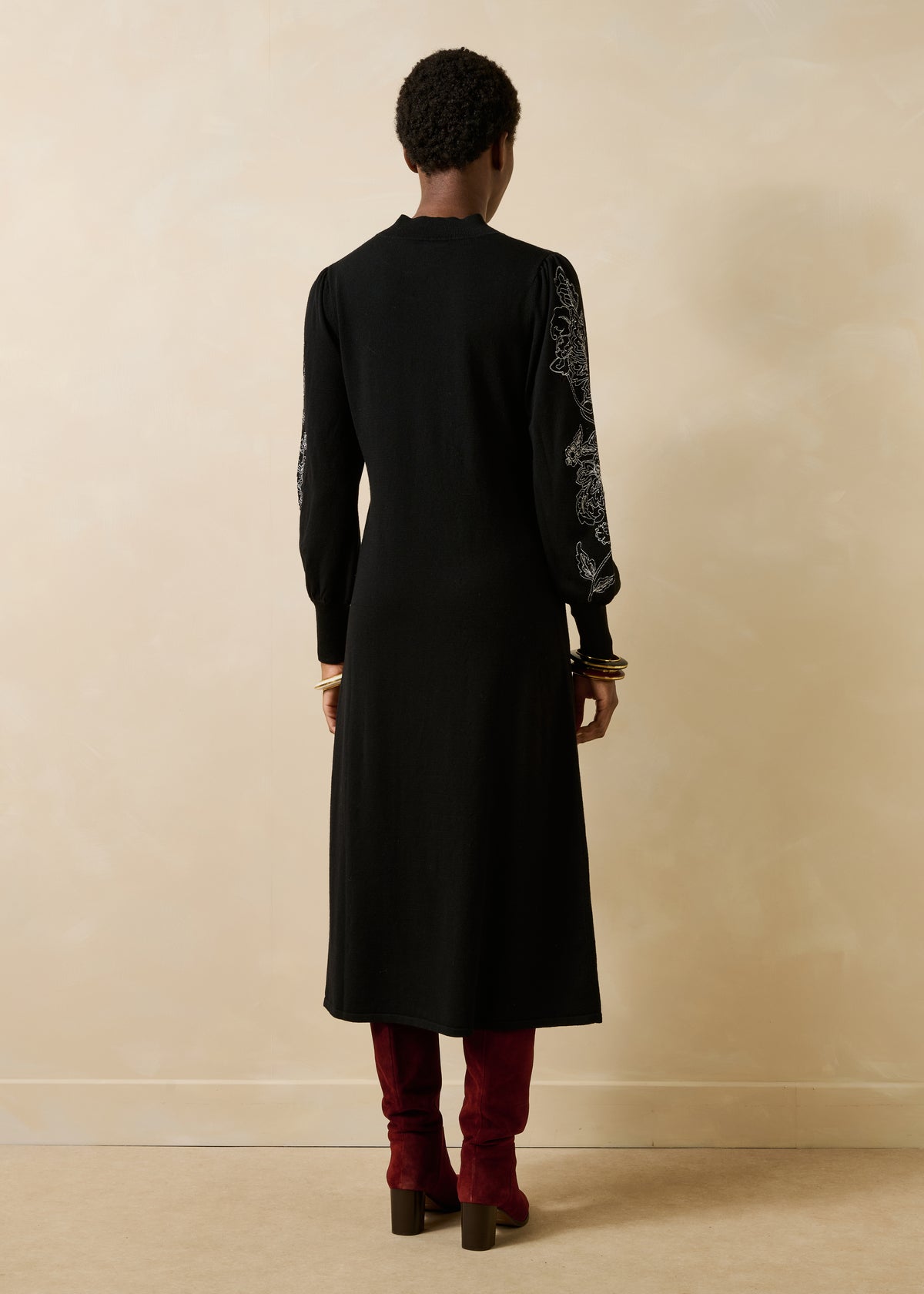 Black knit midi dress with embroidery
