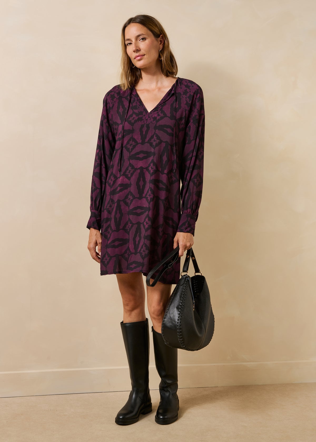 Short black and burgundy dress with long printed sleeves