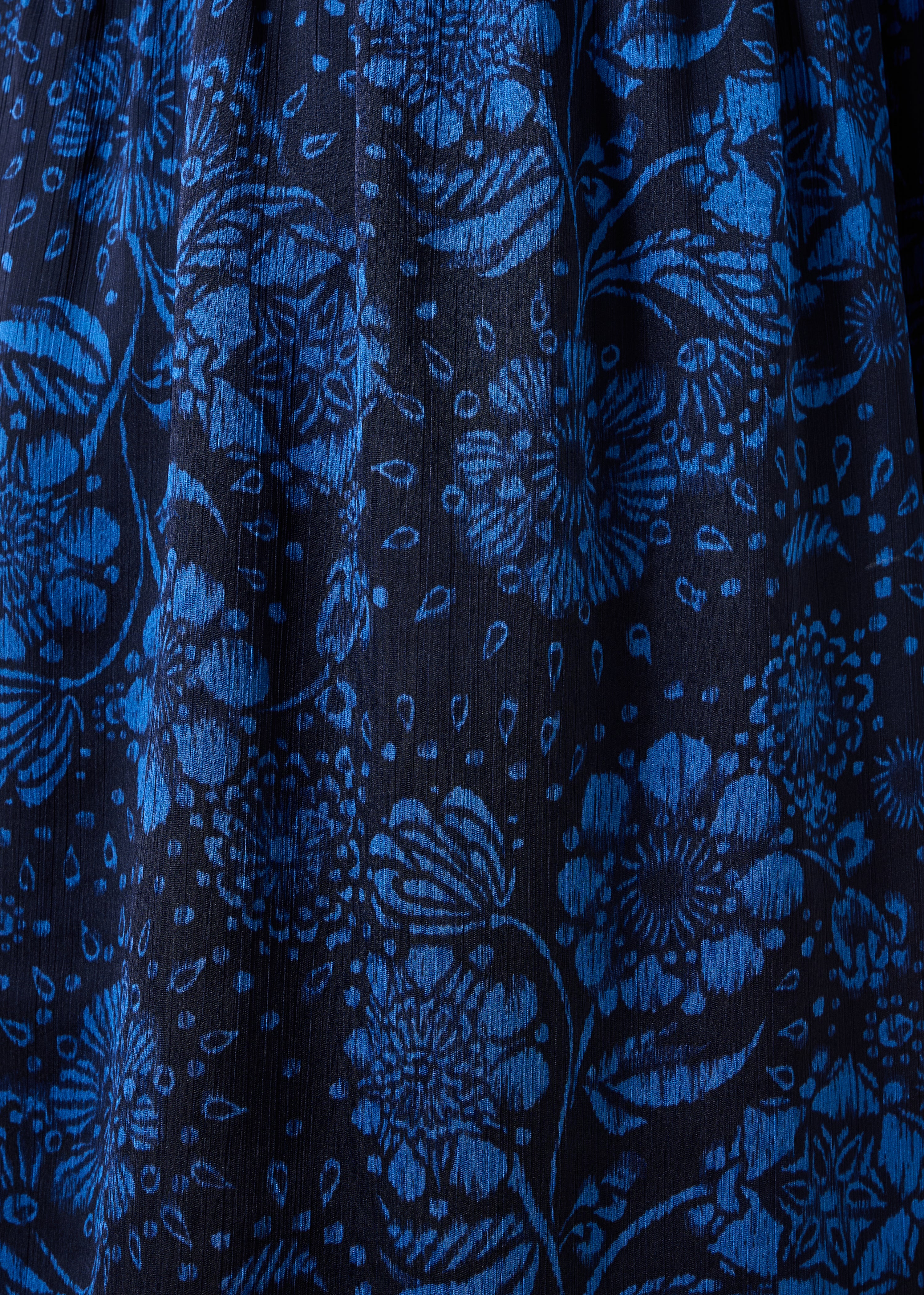 Vestito corto blu con stampa floreale e maniche lunghe